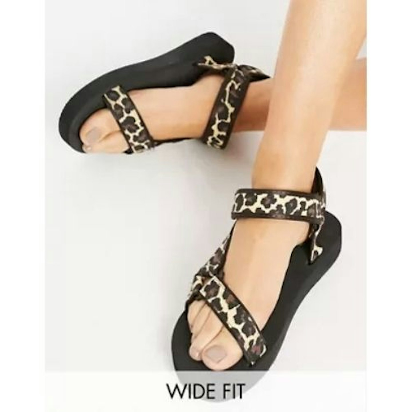 ASOS DESIGN Wide Fit Fix Up sporty sandals in leopard