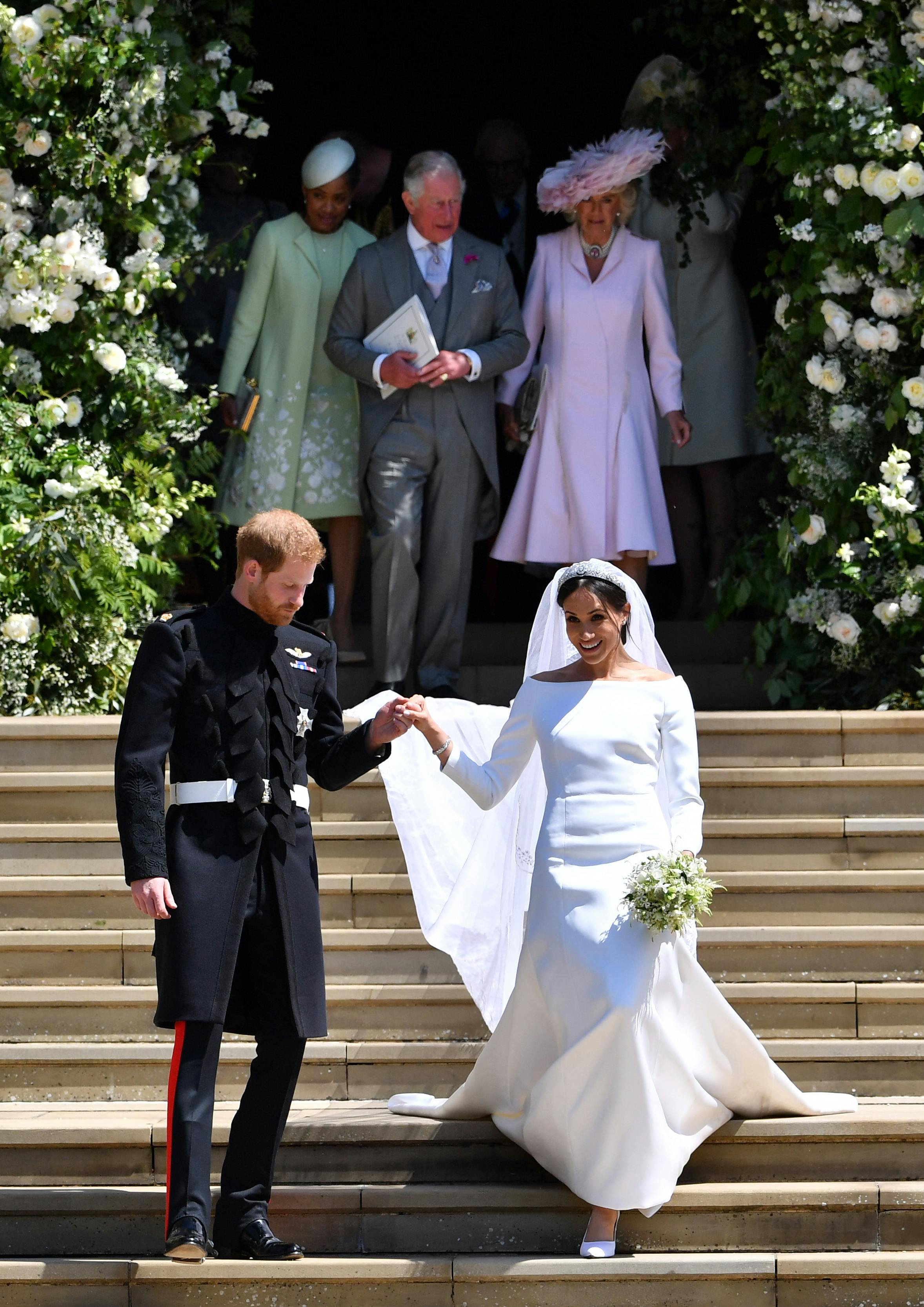 Who designed Meghan Markle's wedding dress? | The US Sun