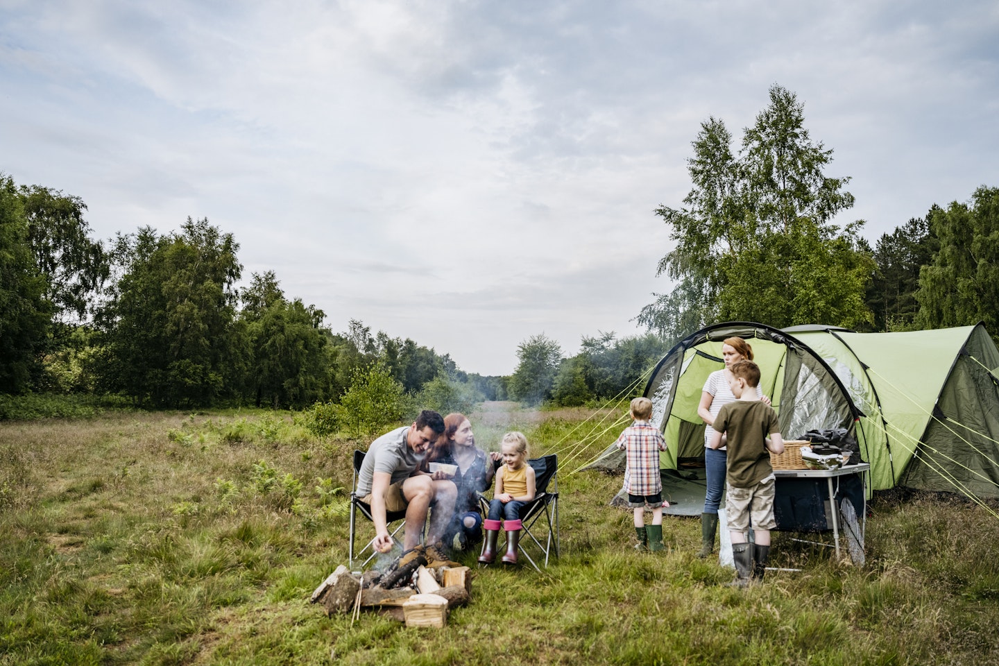 A family camping with their large tent - best 6-man tents