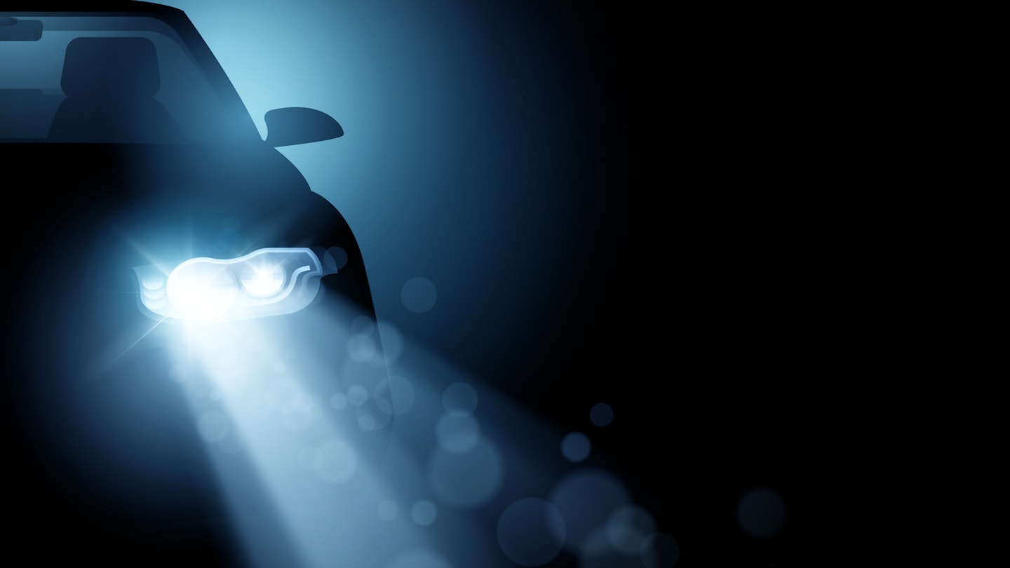 A car's LED headlights turned on 
