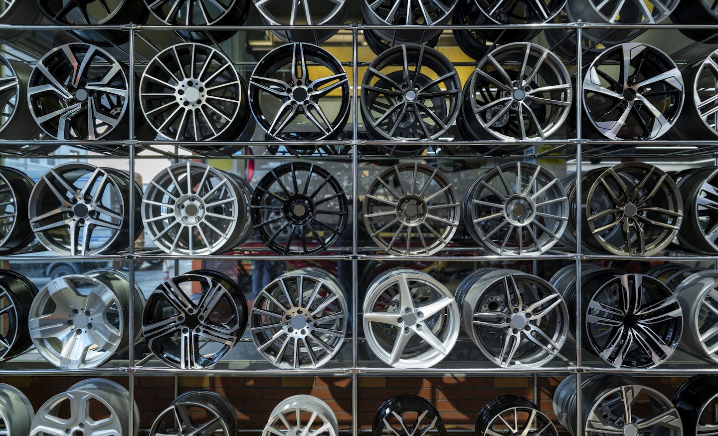 A selection of car rims on display