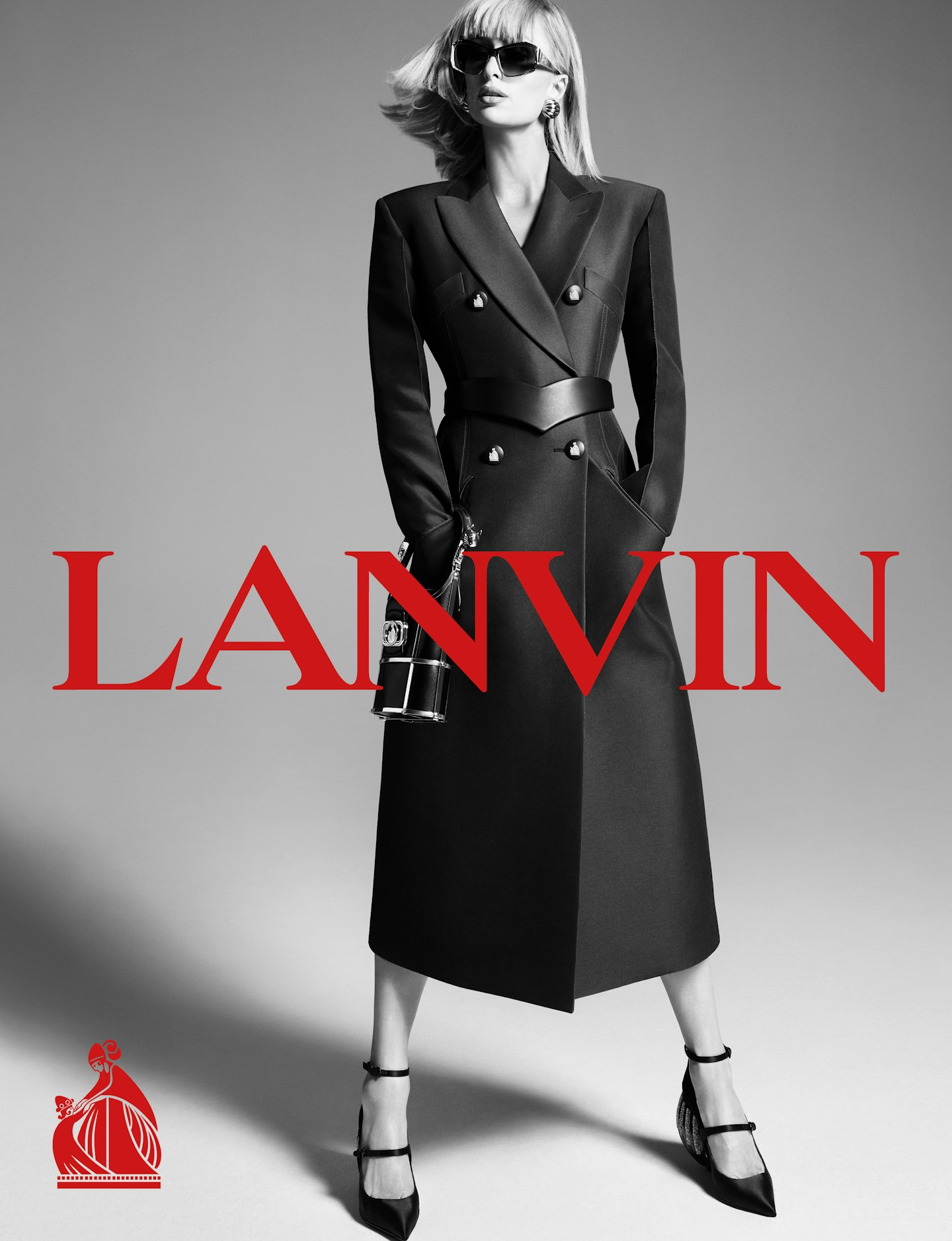 Paris Hilton wearing a cinch-waist leather coat for Lanvin 