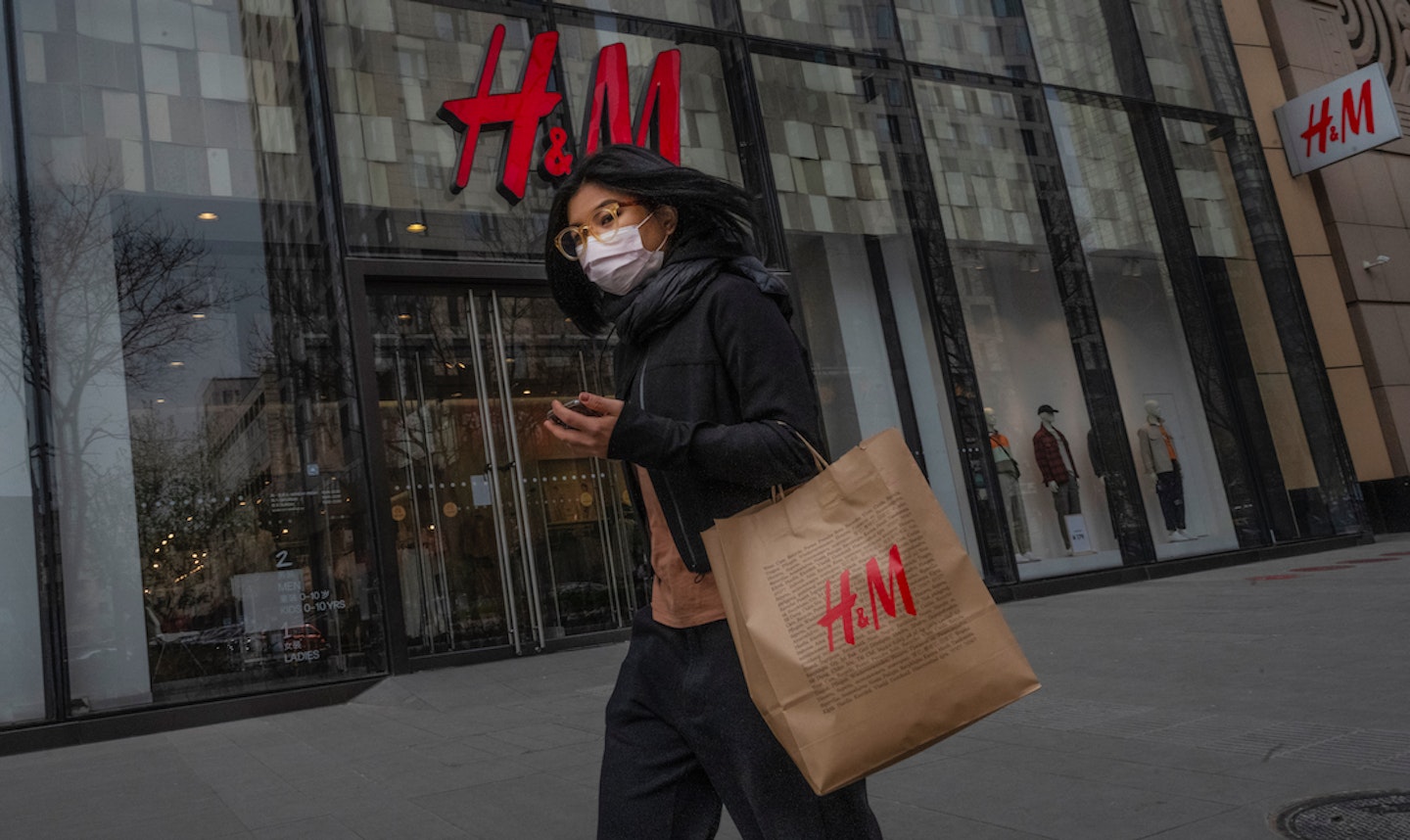A shopper outside H&M