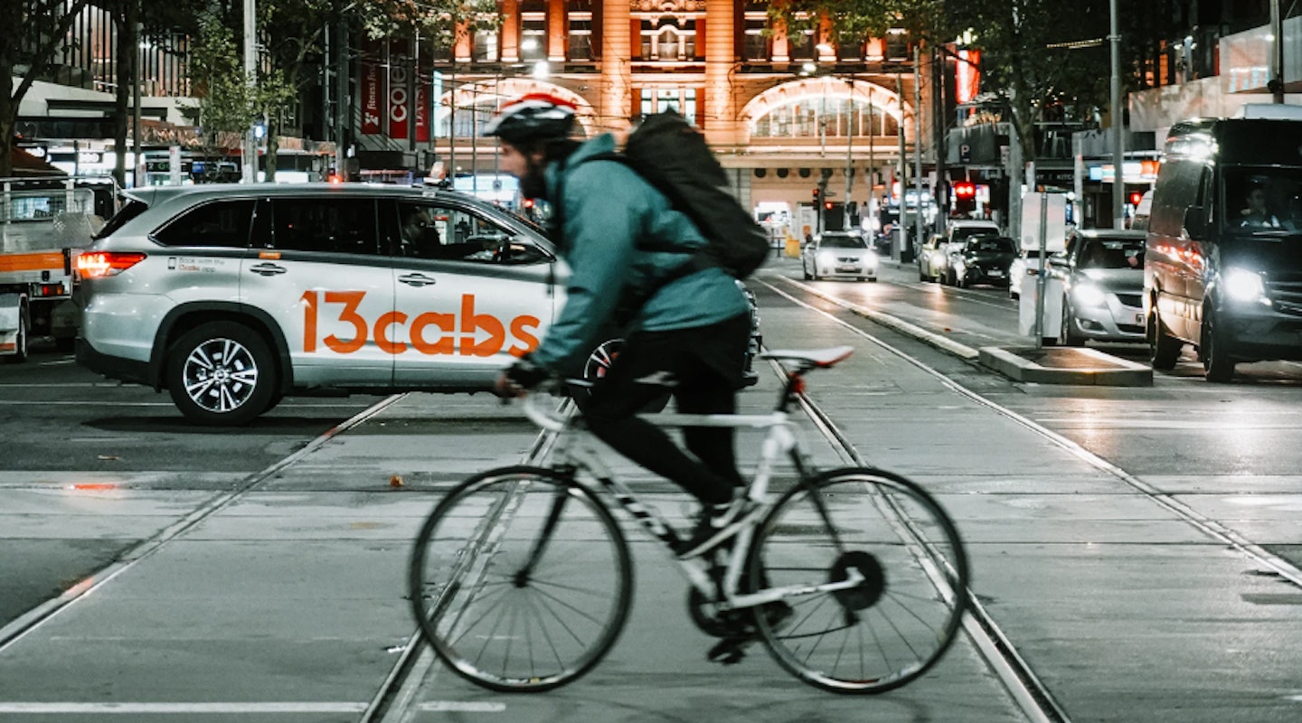 Commuter crossing road