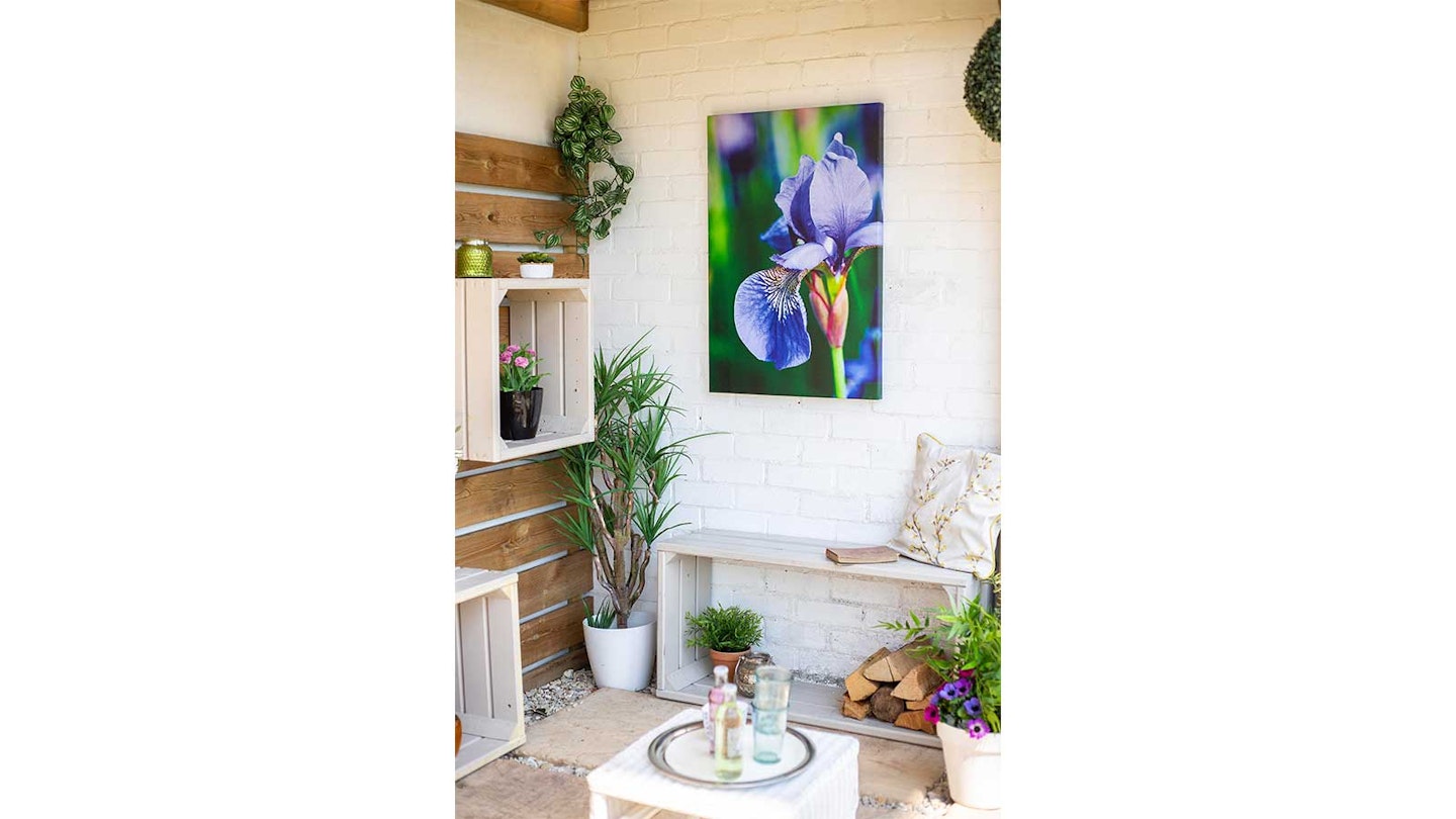 iris flower outdoor canvas on patio with crates as shelves