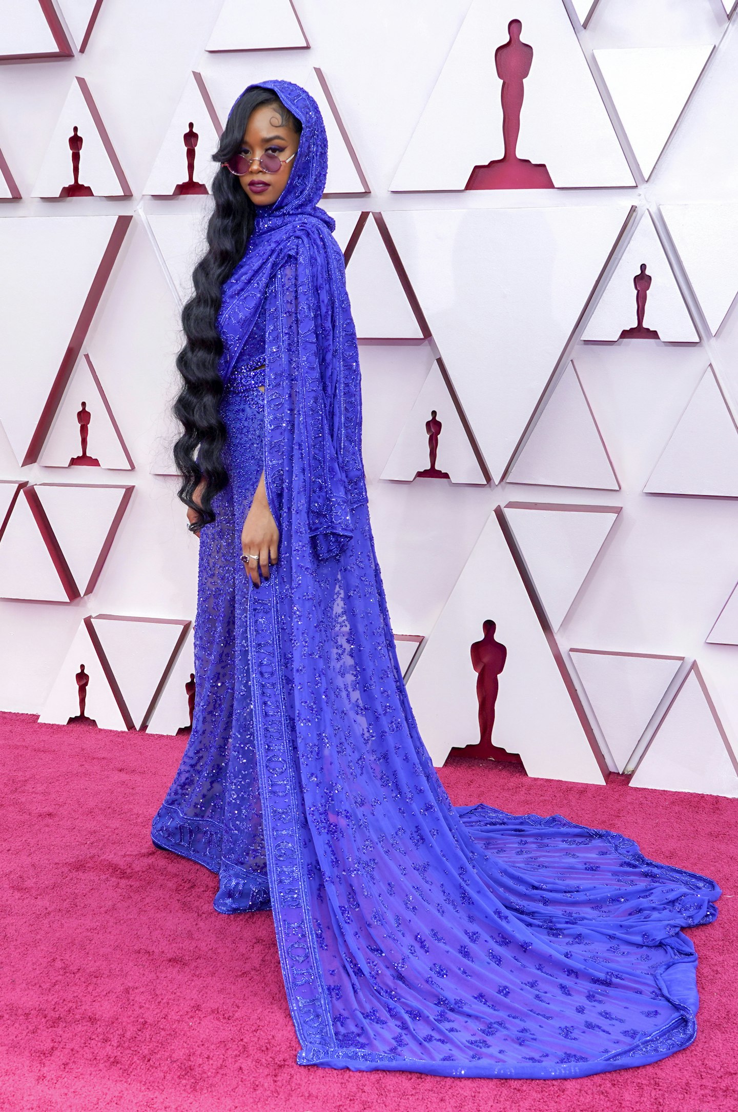 H.E.R in a custom Dundas jumpsuit