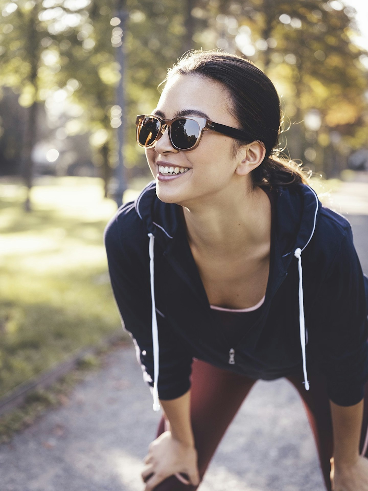 A woman smiling wearing her Fauna sunglasses.