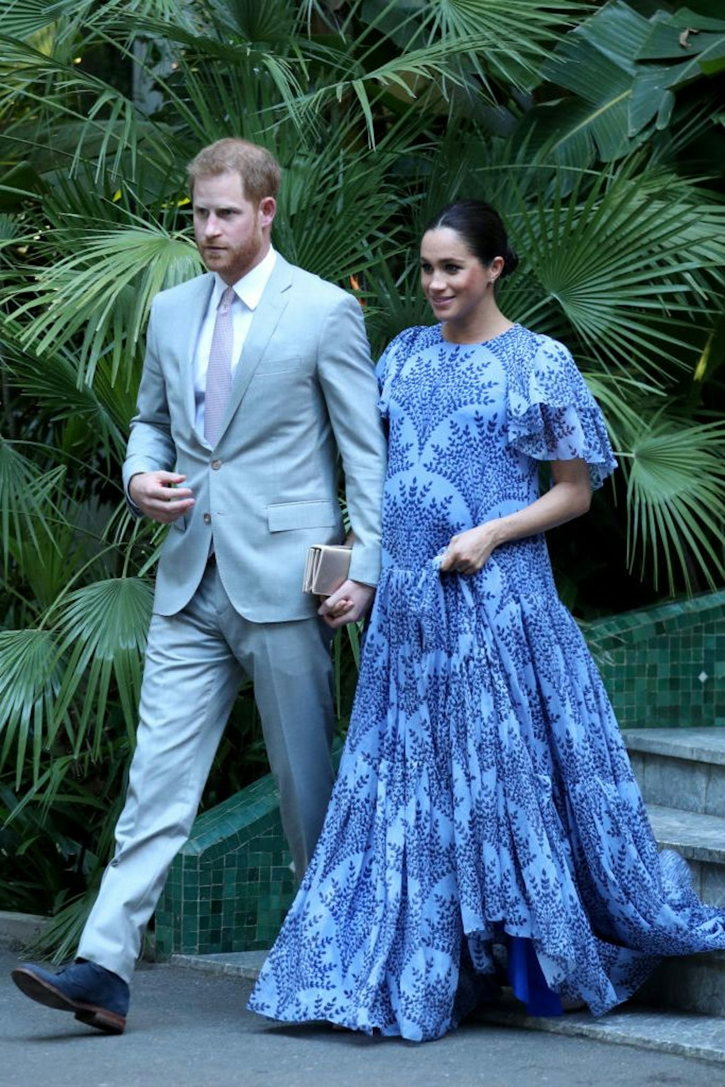 prince harry and Meghan Markle in blue floral dress