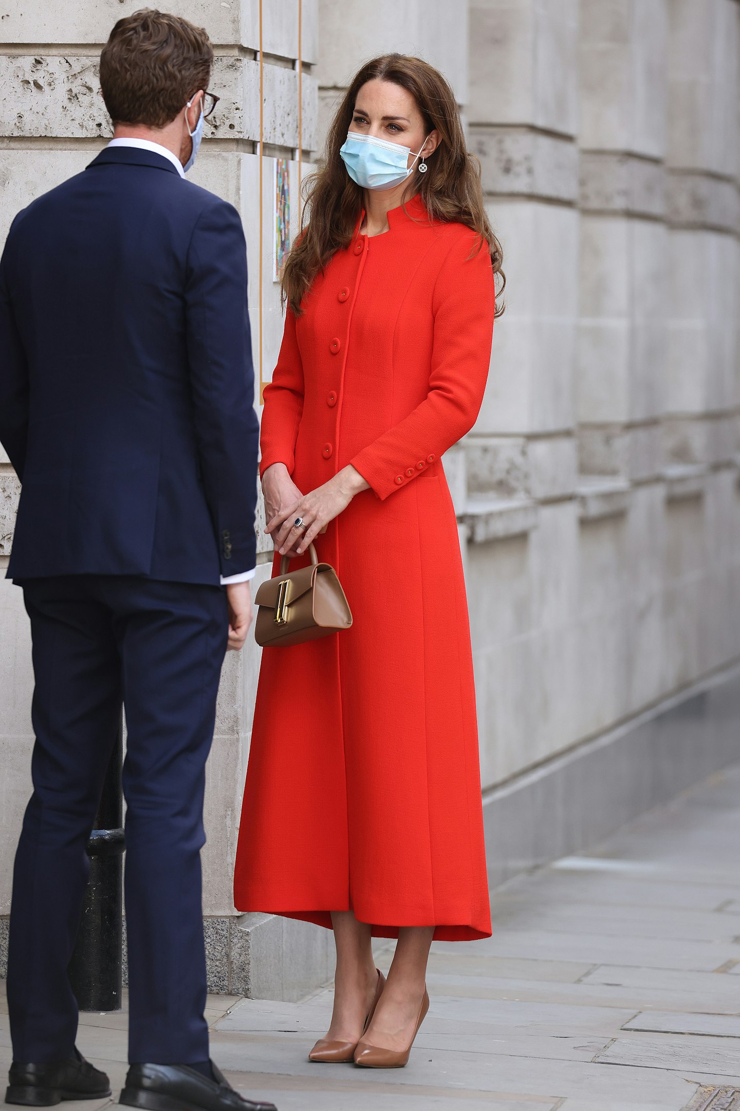 Kate Middleton wearing a scarlet, single-breasted coat from Eponine 