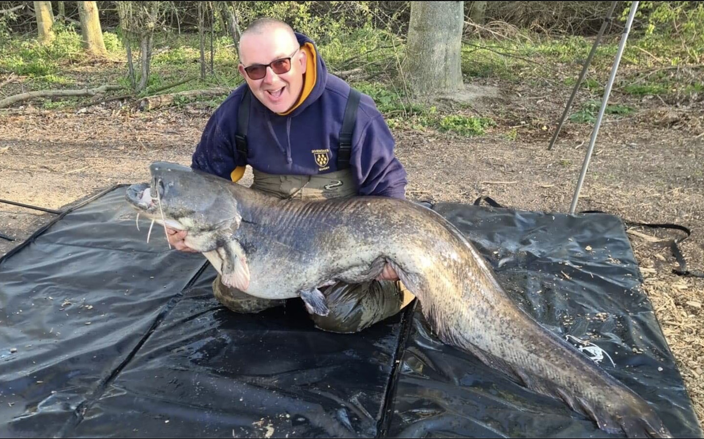 Paul Vizard and his 97lb 15oz catfish from Parr Fishery