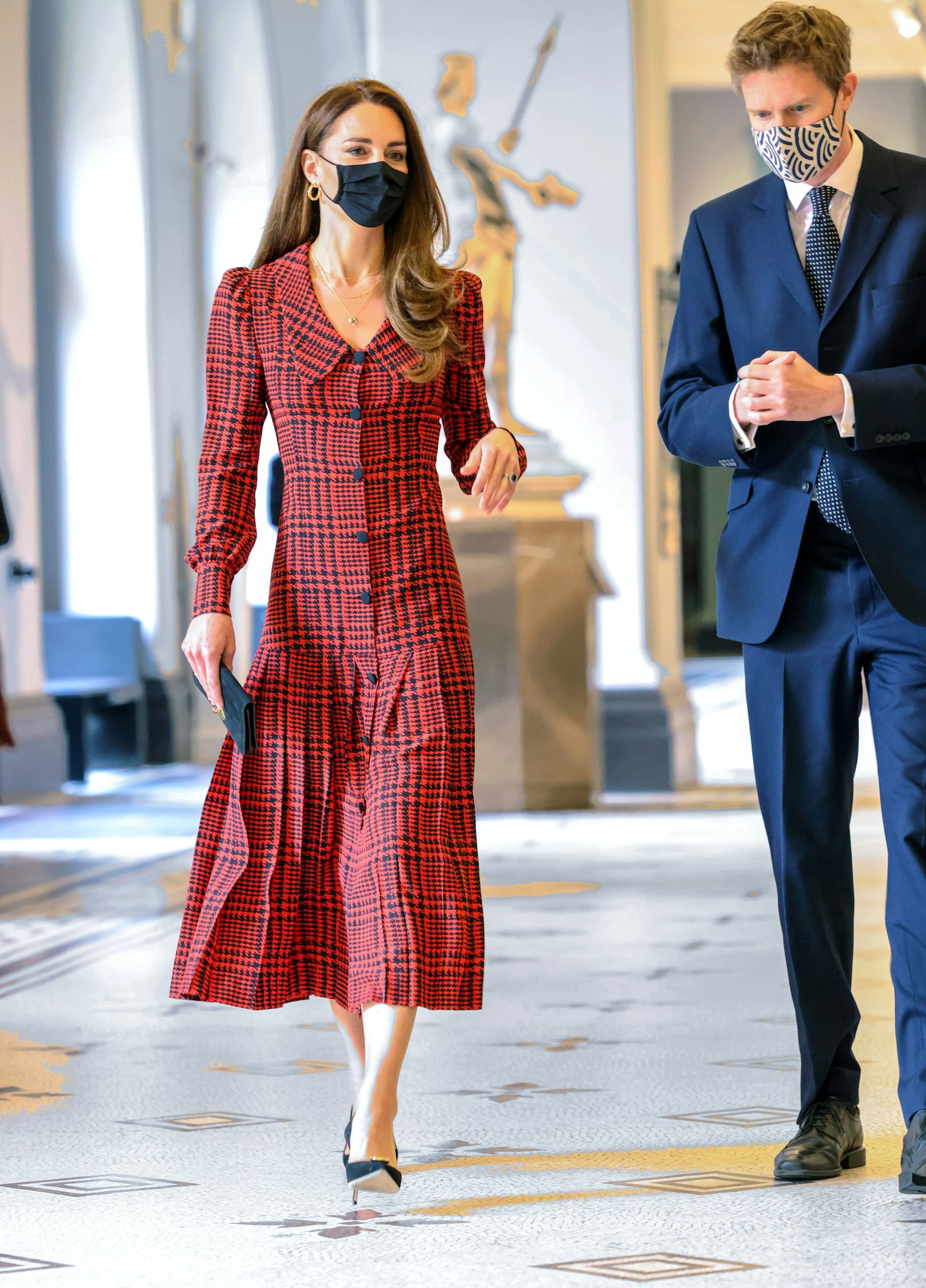 Kate Middleton wearing a red checked dress from Alessandra Rich