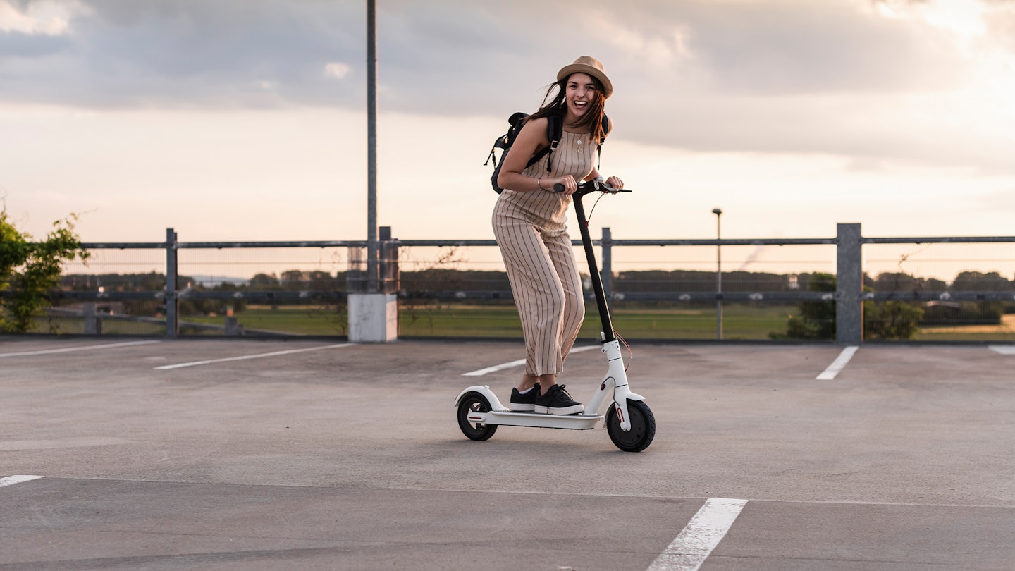 Woman on electric scooter