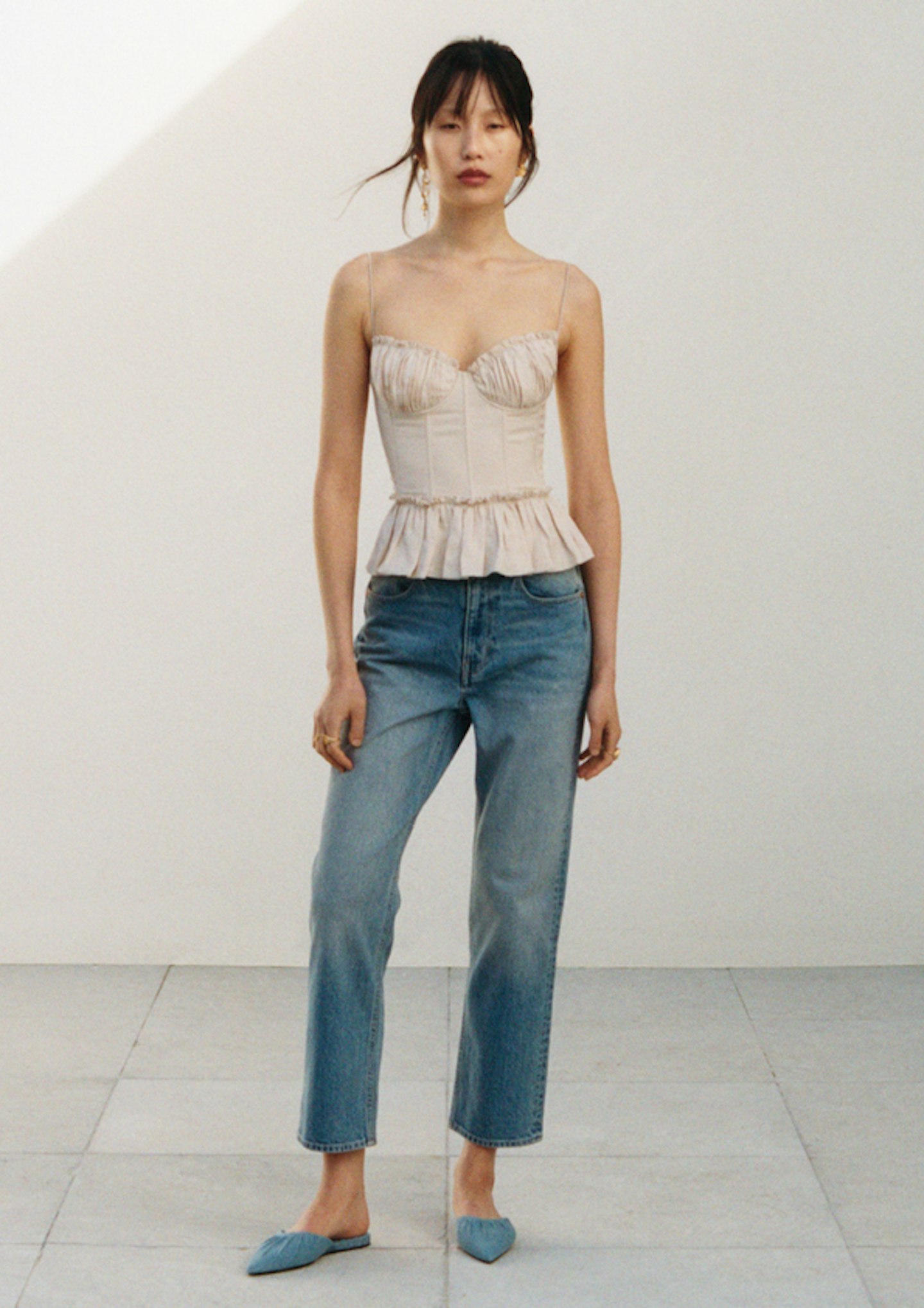 H&M x Brock Collection jeans and corset top
