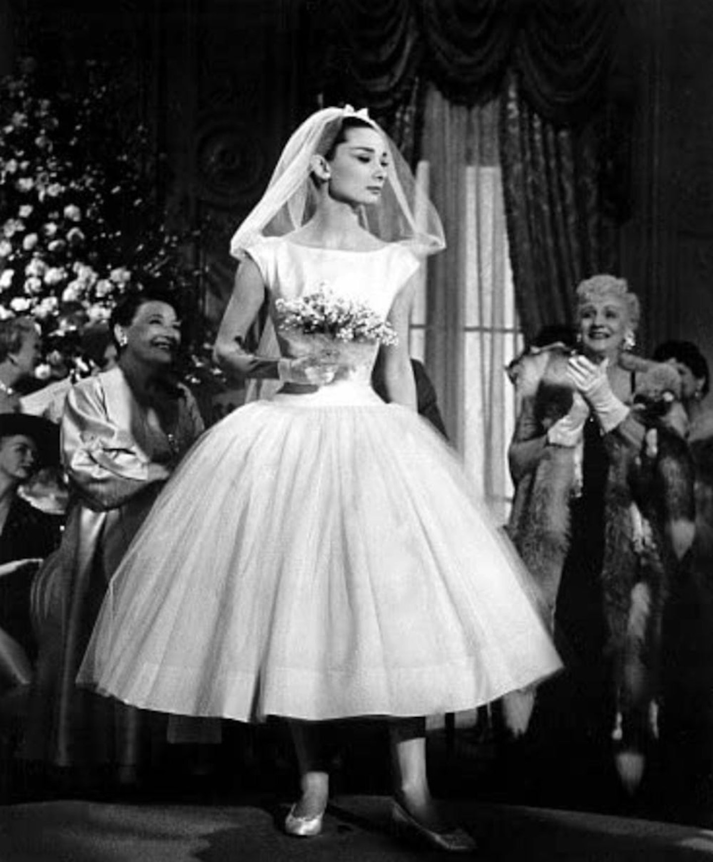 Audrey Hepburn wearing a wedding dress in Funny Face