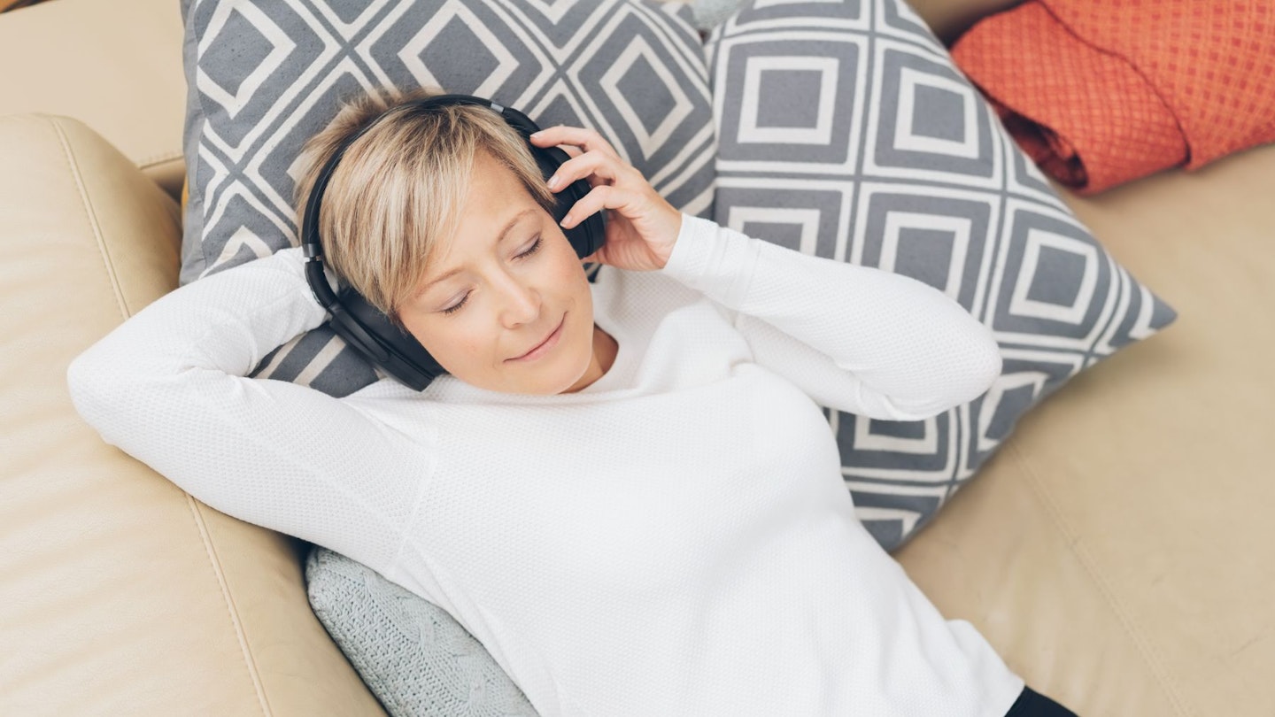 Woman sleeping wearing headphones