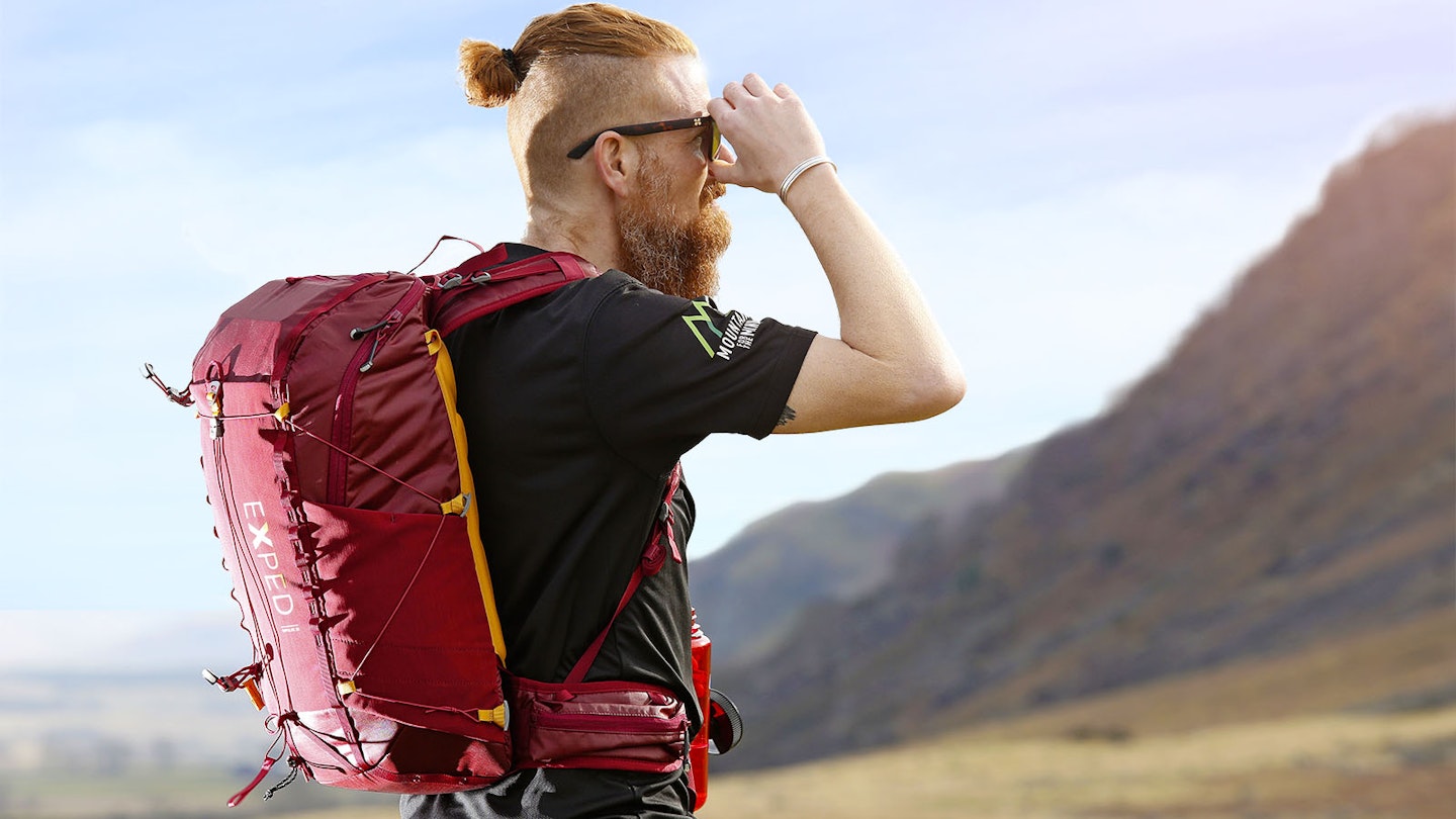 Staff writer Ben Weeks wearing a small hiking pack