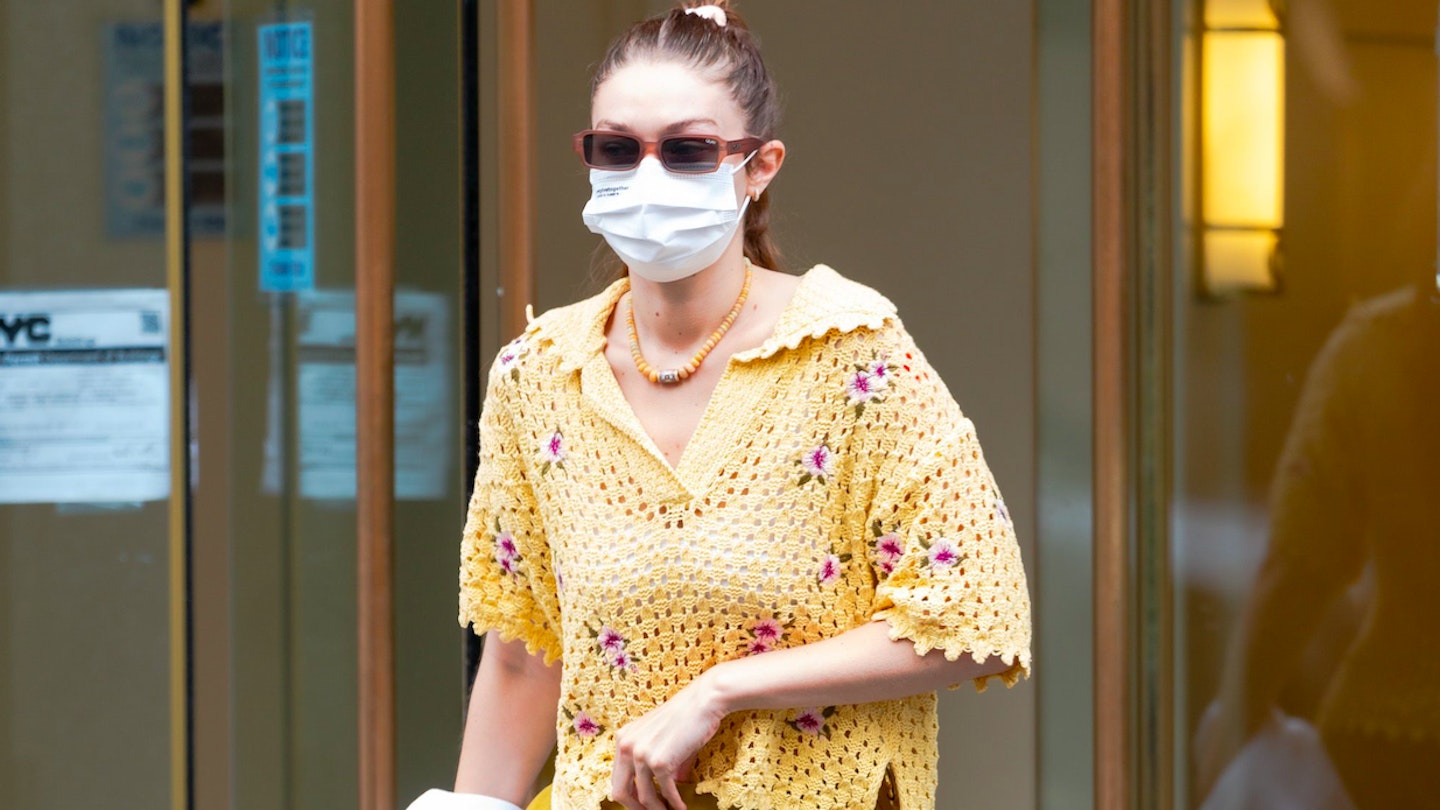 Gigi Hadid wearing crochet and a face mask in New York 