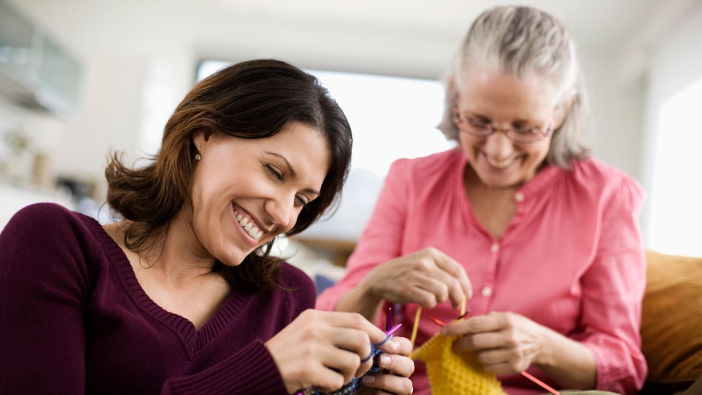 Women knitting together