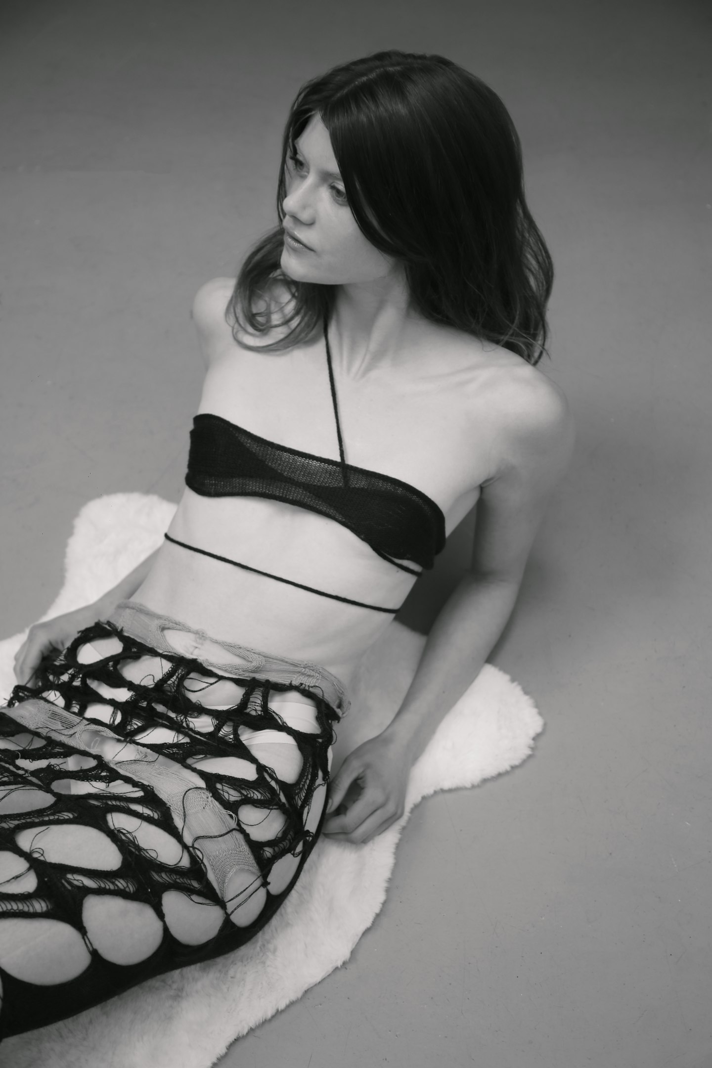 A model wearing an outfit by Emma Mackenzie 