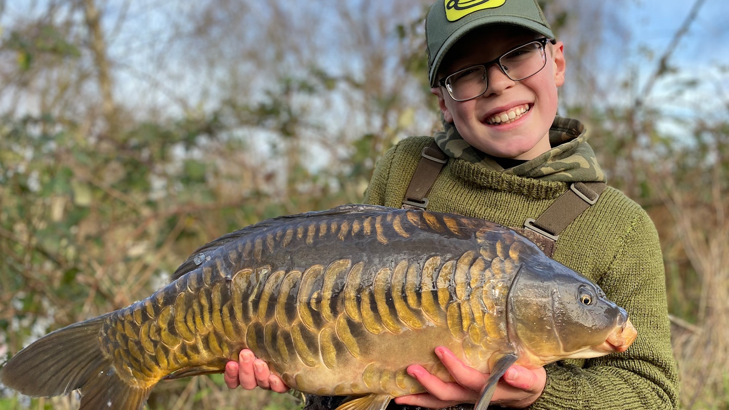 Schoolboy completes cross-channel cast for fishing charity 