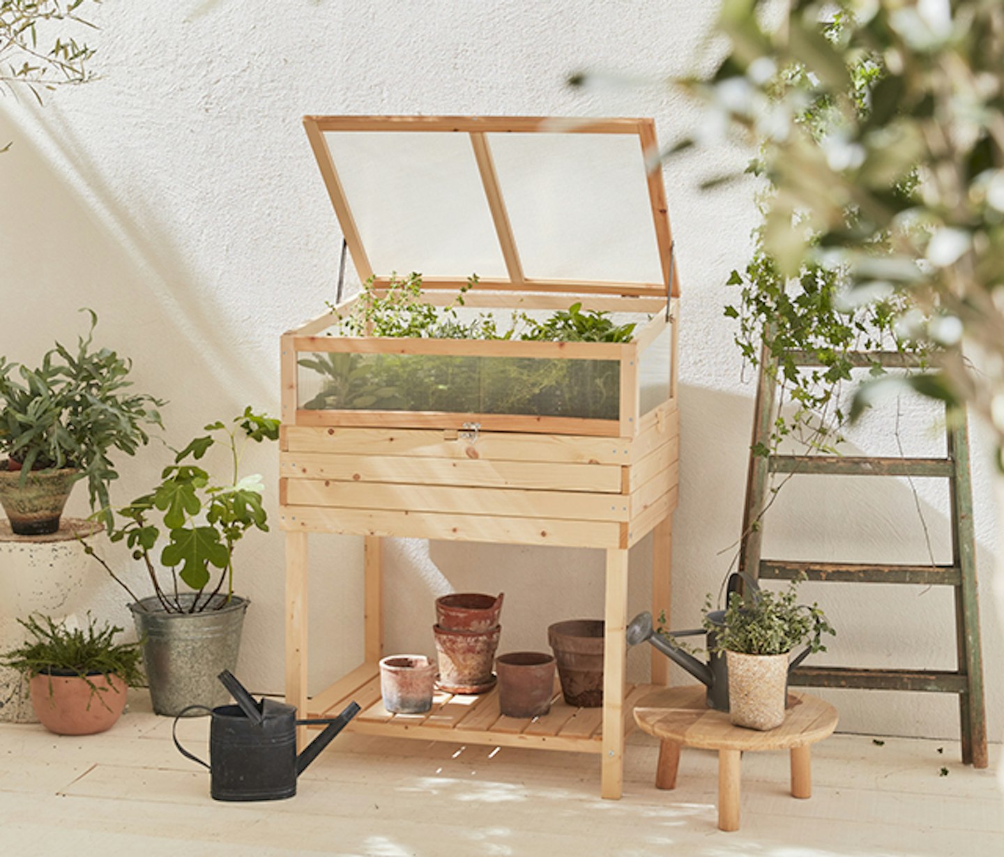 Wooden planter with removable greenhouse