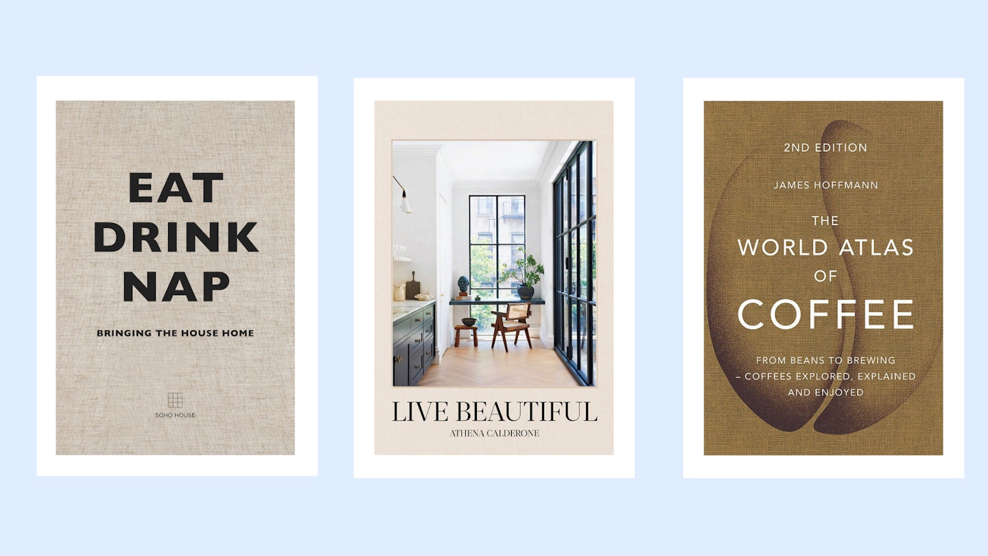 Coffee table books on a blue and white background