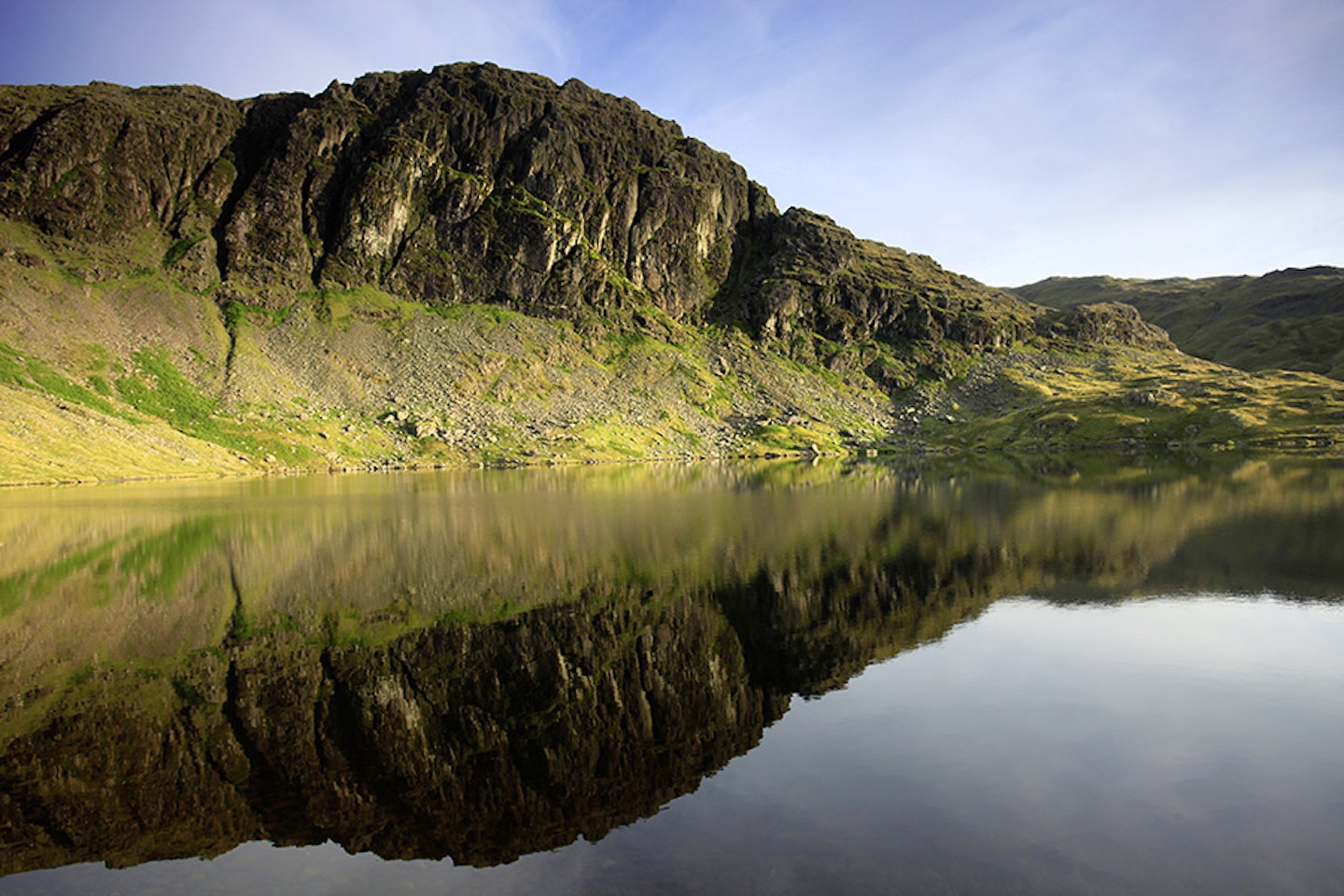 Pavey Ark over Stickle Tarn, with Jack's Rake running up across the face from right to left.