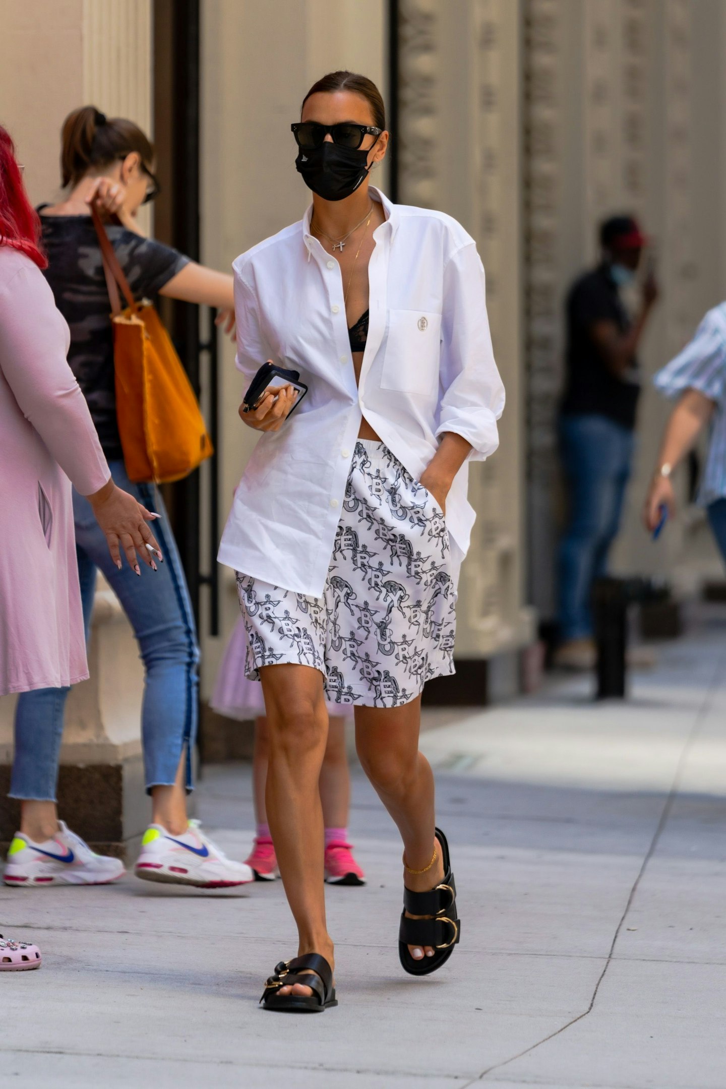 Irina Shayk wearing chunky black sandals