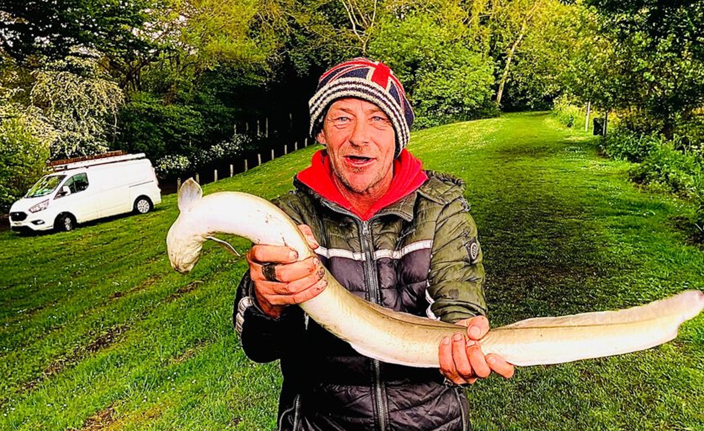 Matthew Smith and his estimated 8lb eel from the Kennet & Avon canal