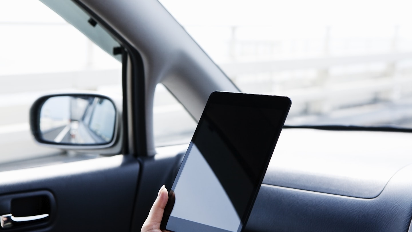 Tablet being used in a car