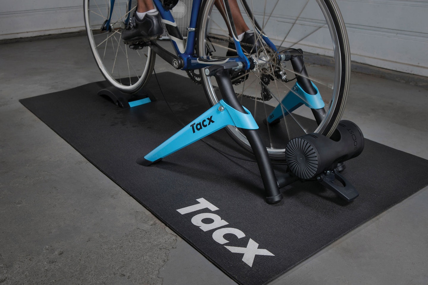 Tacx Boost turbo trainer on a mat