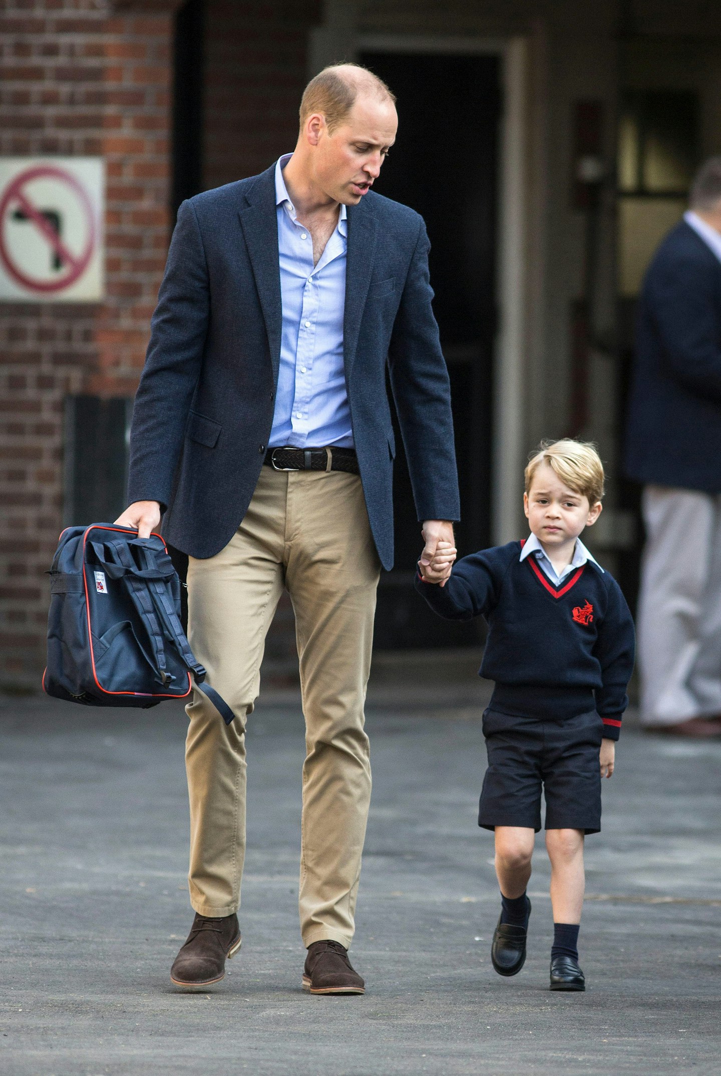 Prince George arriving with the Duke of Cambridge at Thomas's Battersea in London