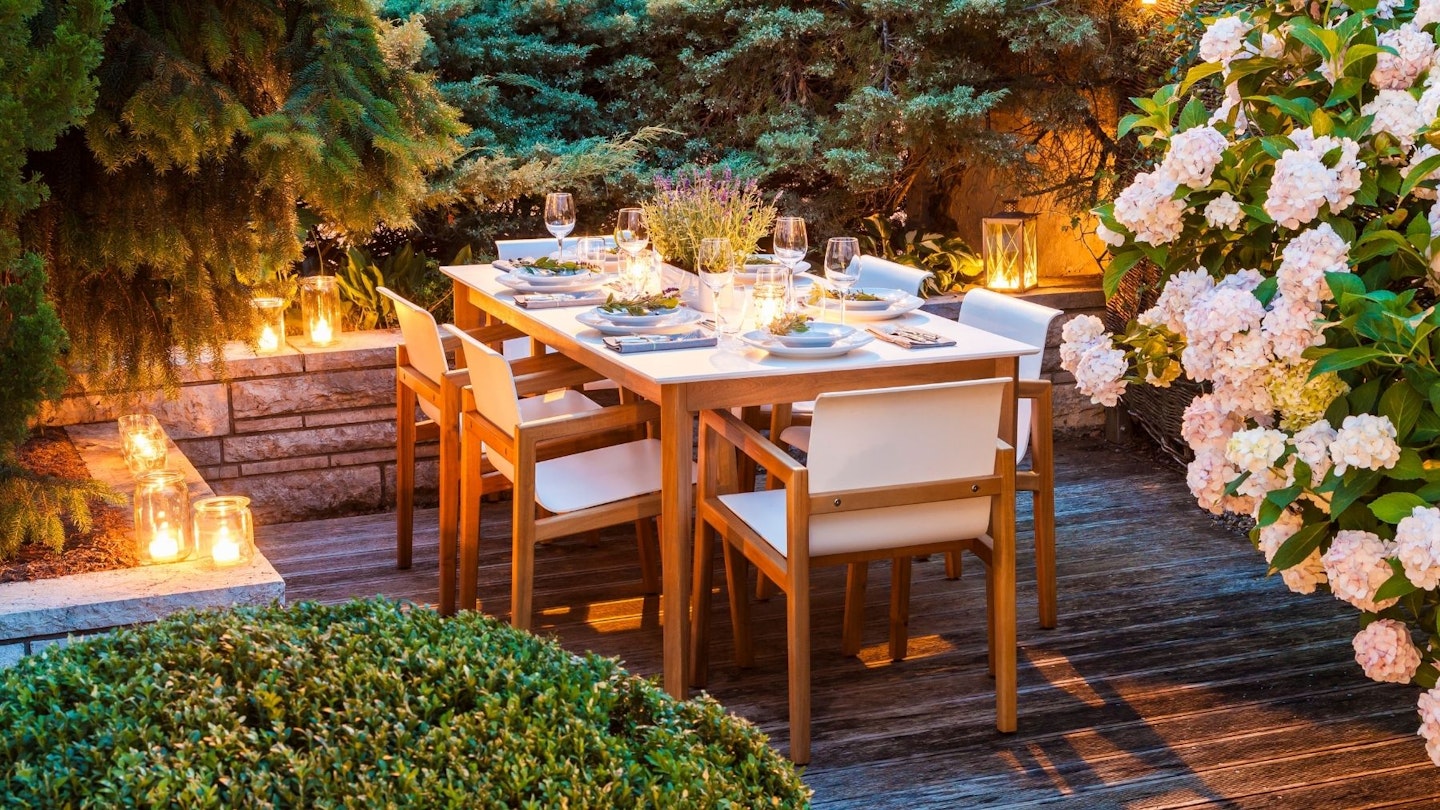 Outdoor dining table with tableware set 