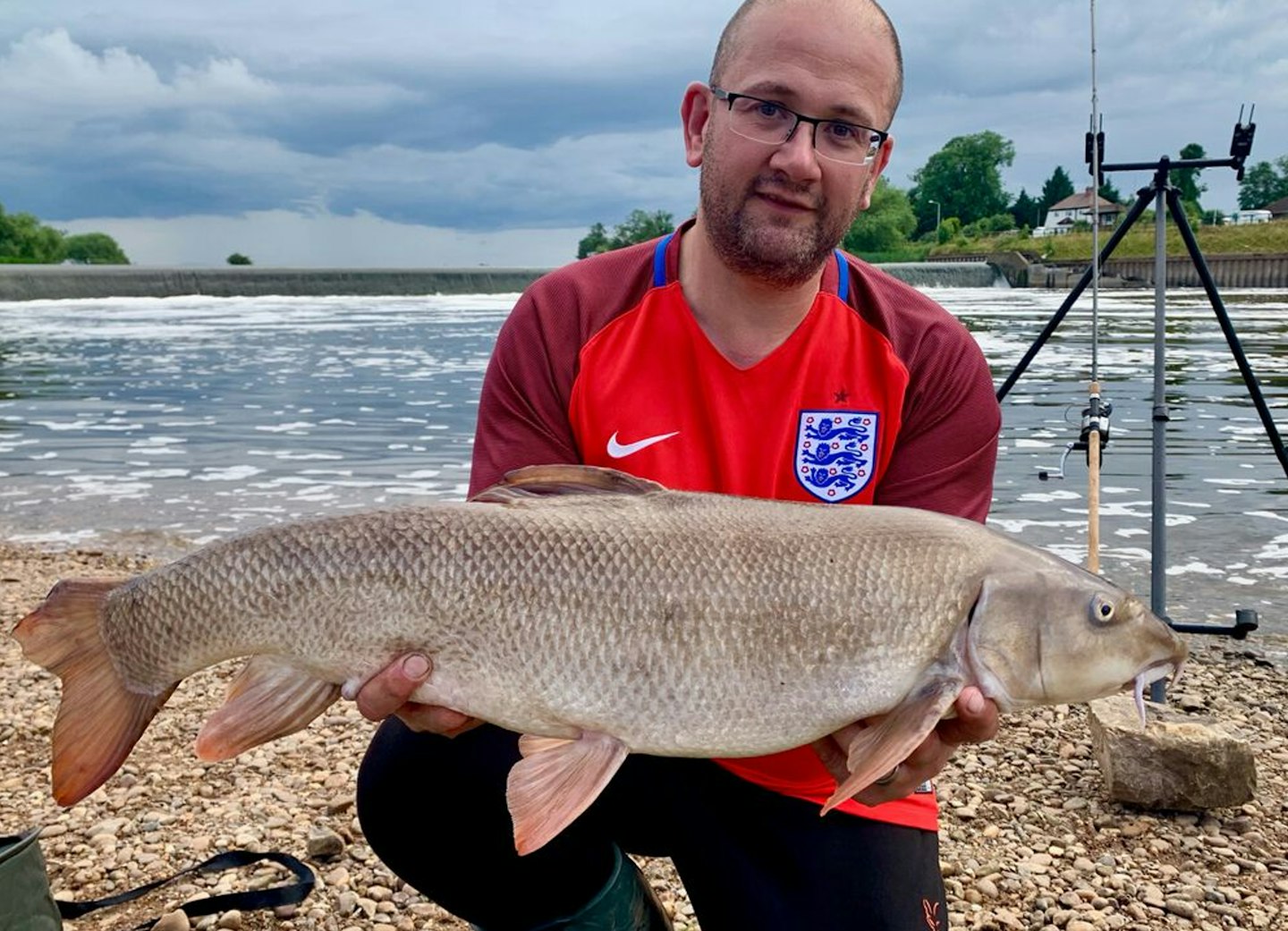 Andy Walker and one of the barbel from a mega Trent haul