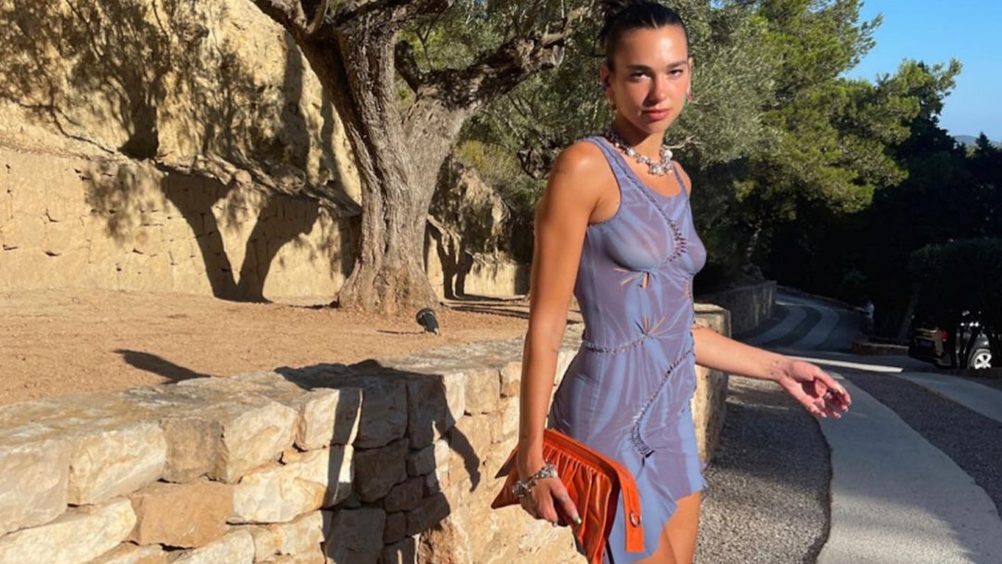 dua lipa mini dress DuaLipa wears a custom-made #AtelierVersace mini dress in Swarovski crystal mesh in the music video for her song Levitating. #VersaceCelebrities Photographer: Lauren Leekley