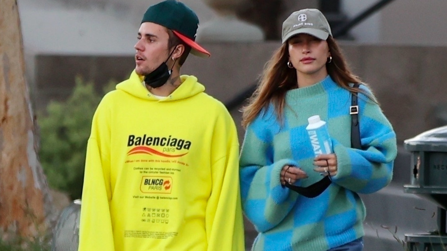 Hailey Bieber wearing a checkered jumper from Stine Goya