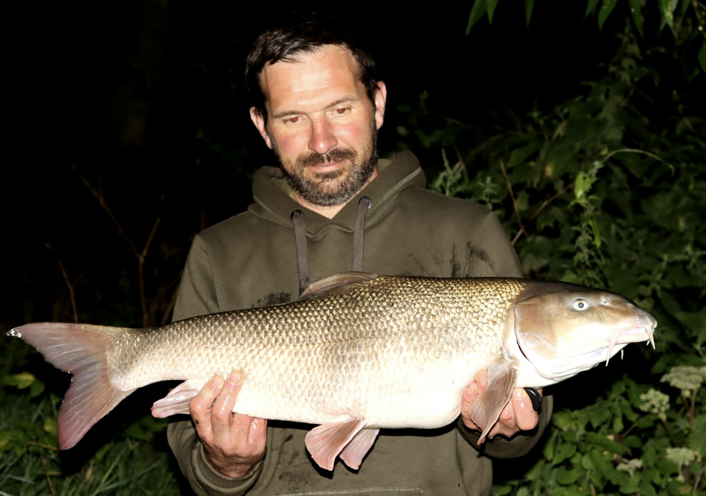 Simon Daley and his 15lb-plus Thames barbel