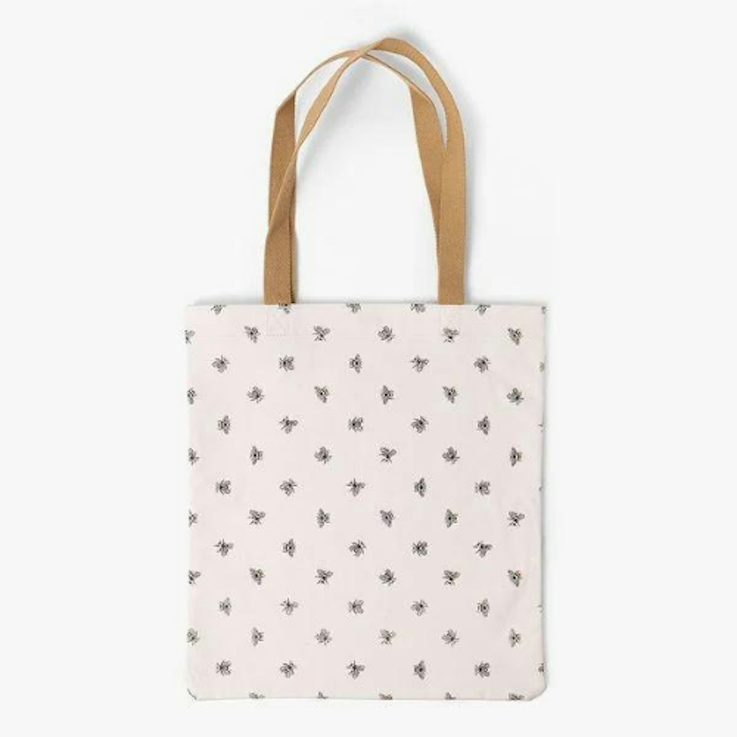 Paperchase tote bag with bee design and dark orange straps on a white background