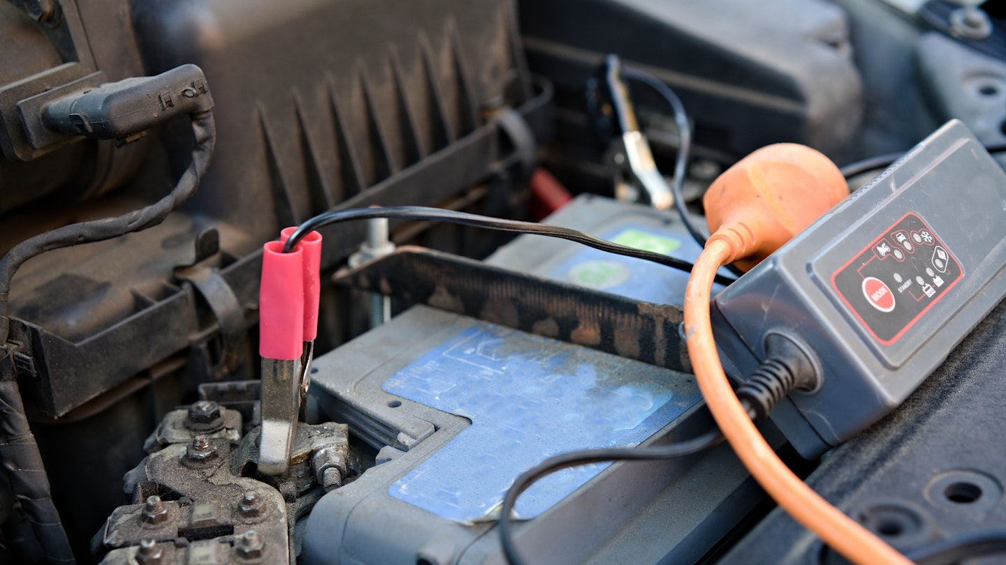 A charger connected to a car battery