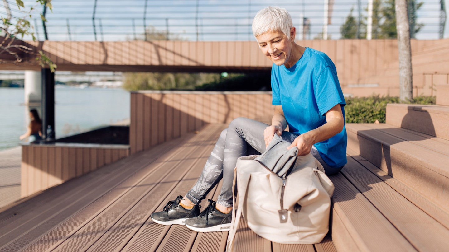 Woman with gym bag