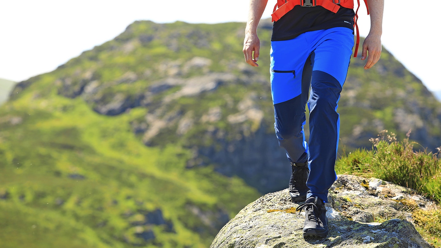 Hiker in UK wearing blue walking trousers