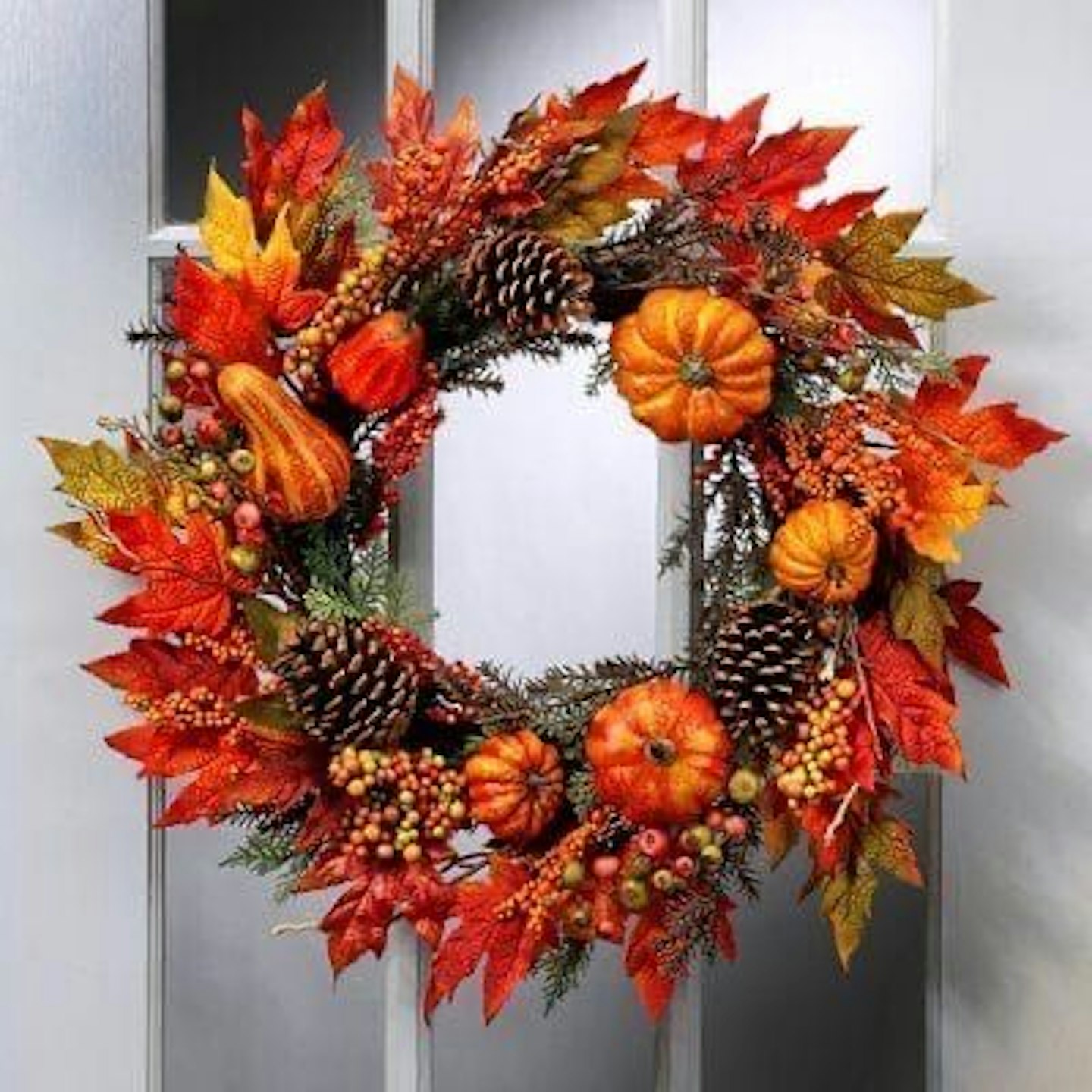 Autumn wreath with pumpkins
