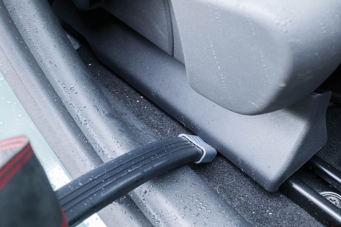 The Henry Hoover Crevice tool in use under a car seat