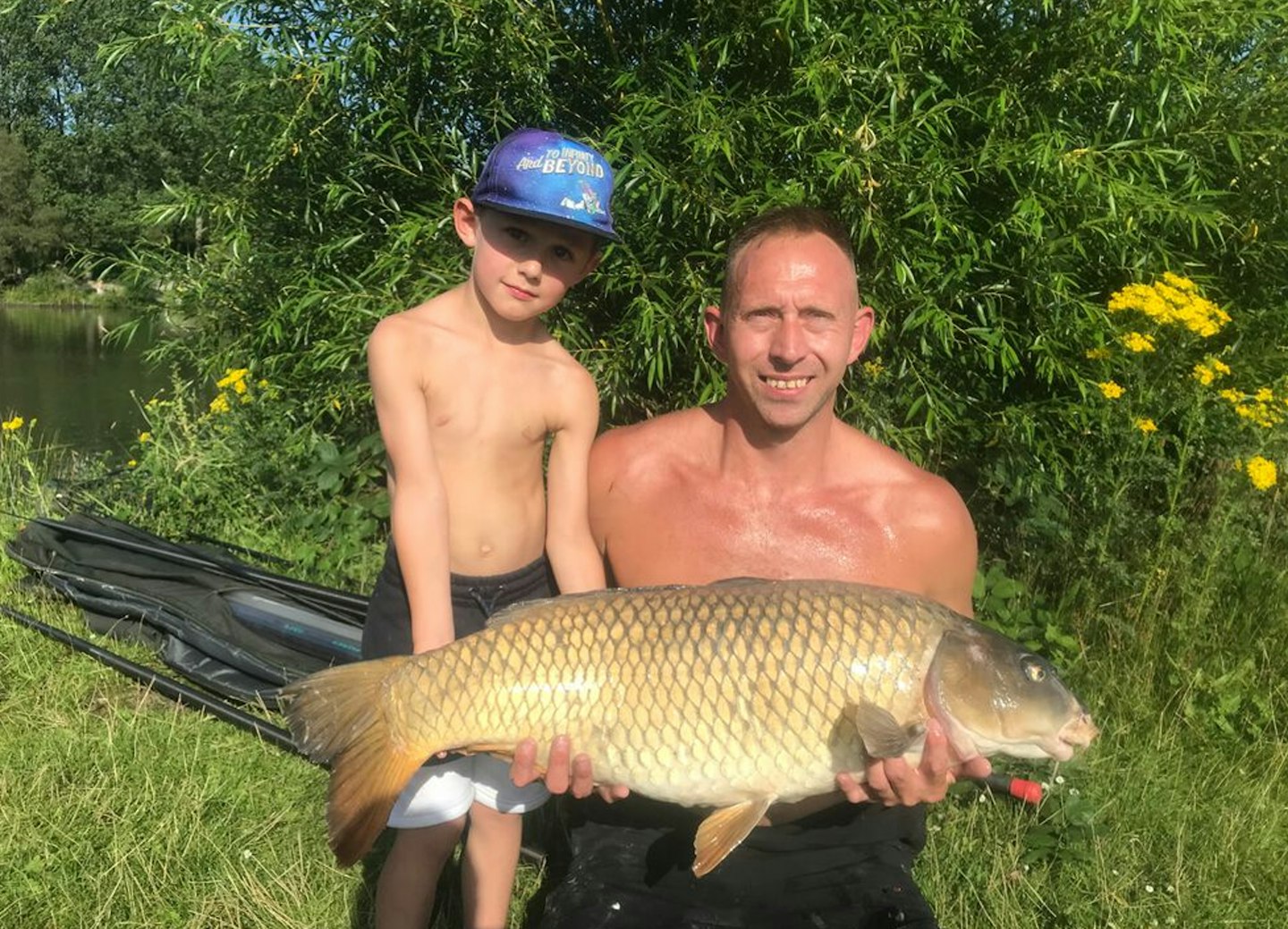 Michael Brown and son Olly show off the huge 30lb 9oz carp