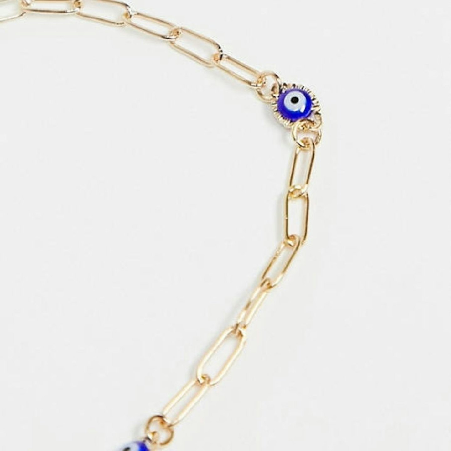 ASOS DESIGN Curve anklet with blue eye charms in gold tone