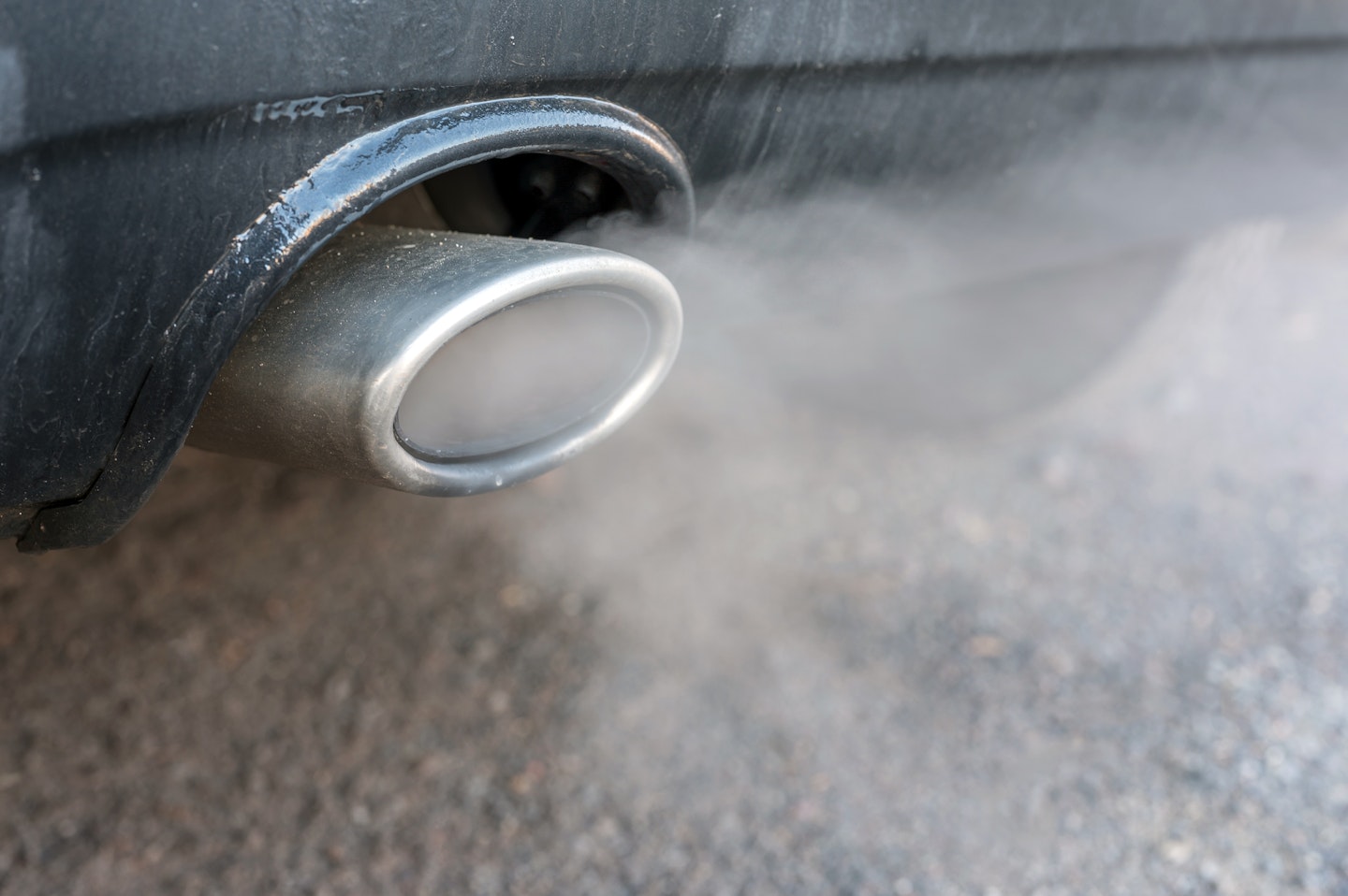 The exhaust pipe from a diesel car