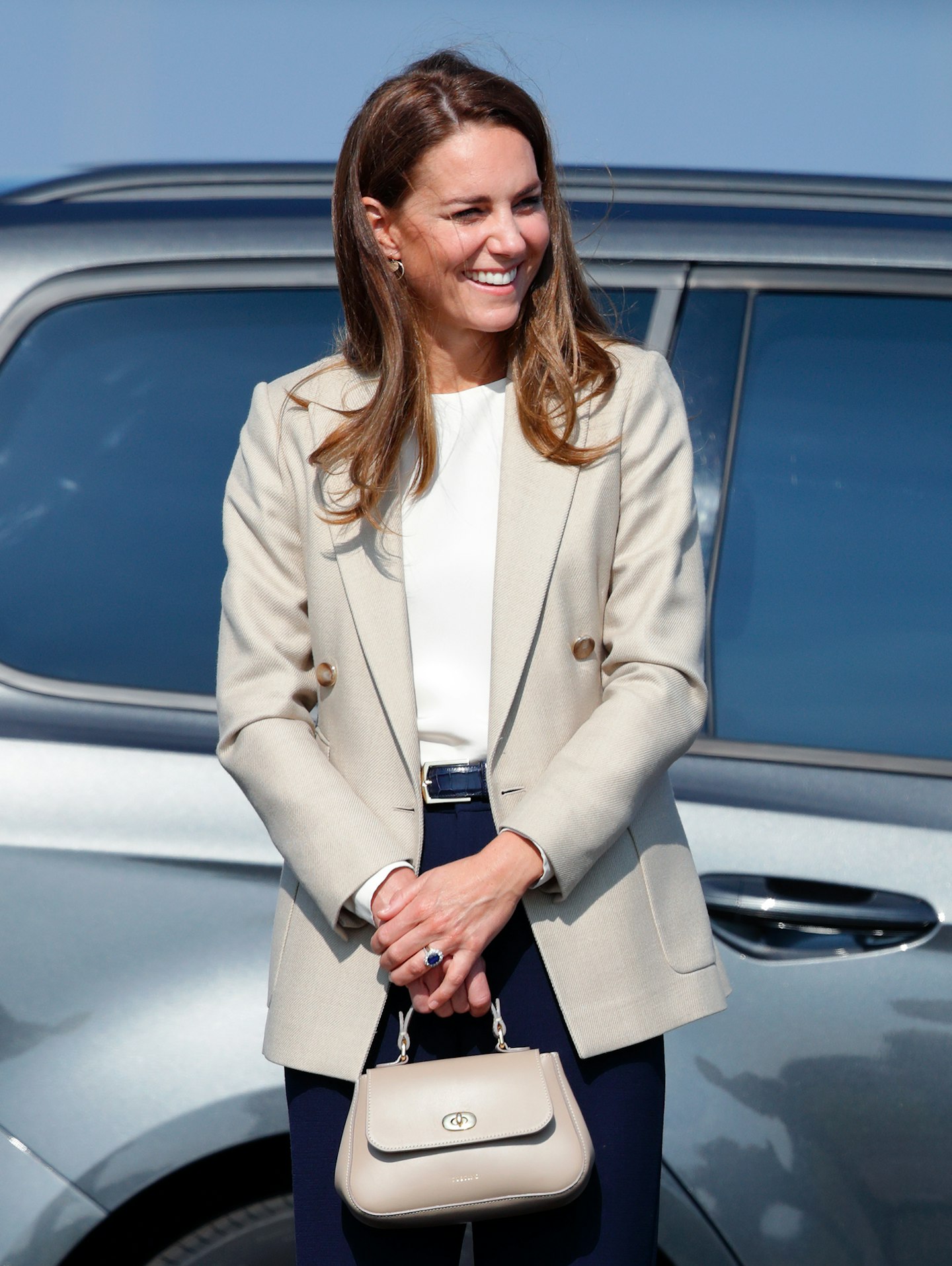 Kate Middleton wearing gold earrings from All The Falling Stars
