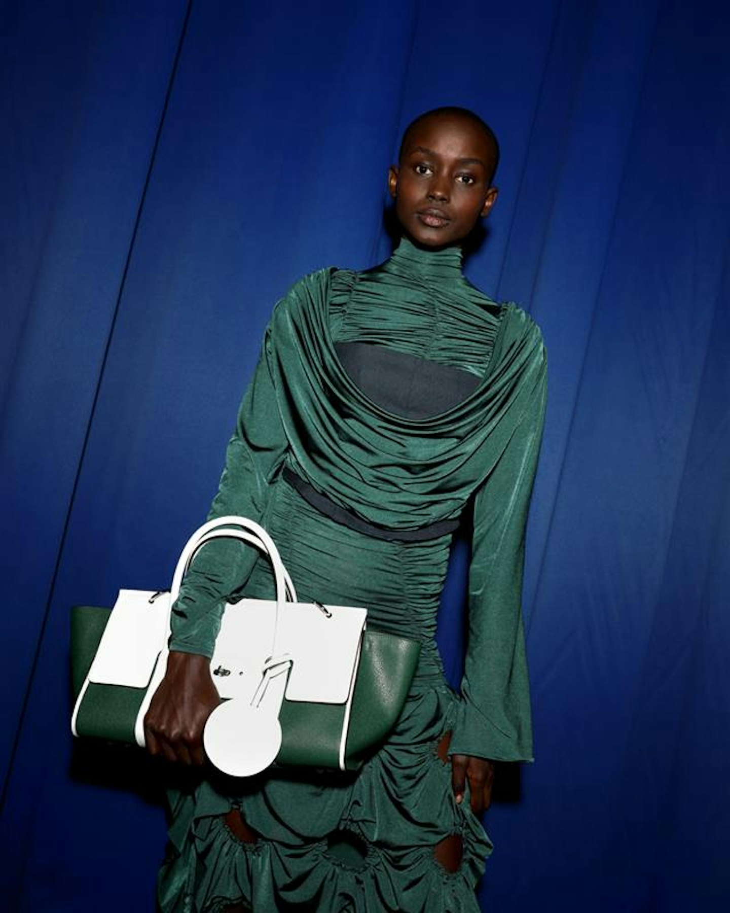 A model carrying the Mulberry x Richard Malone Bayswater