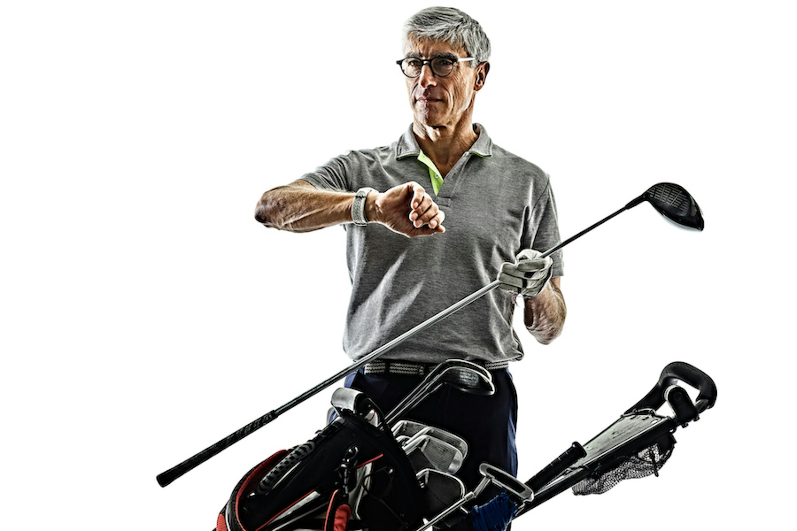 Man looking at golf watch