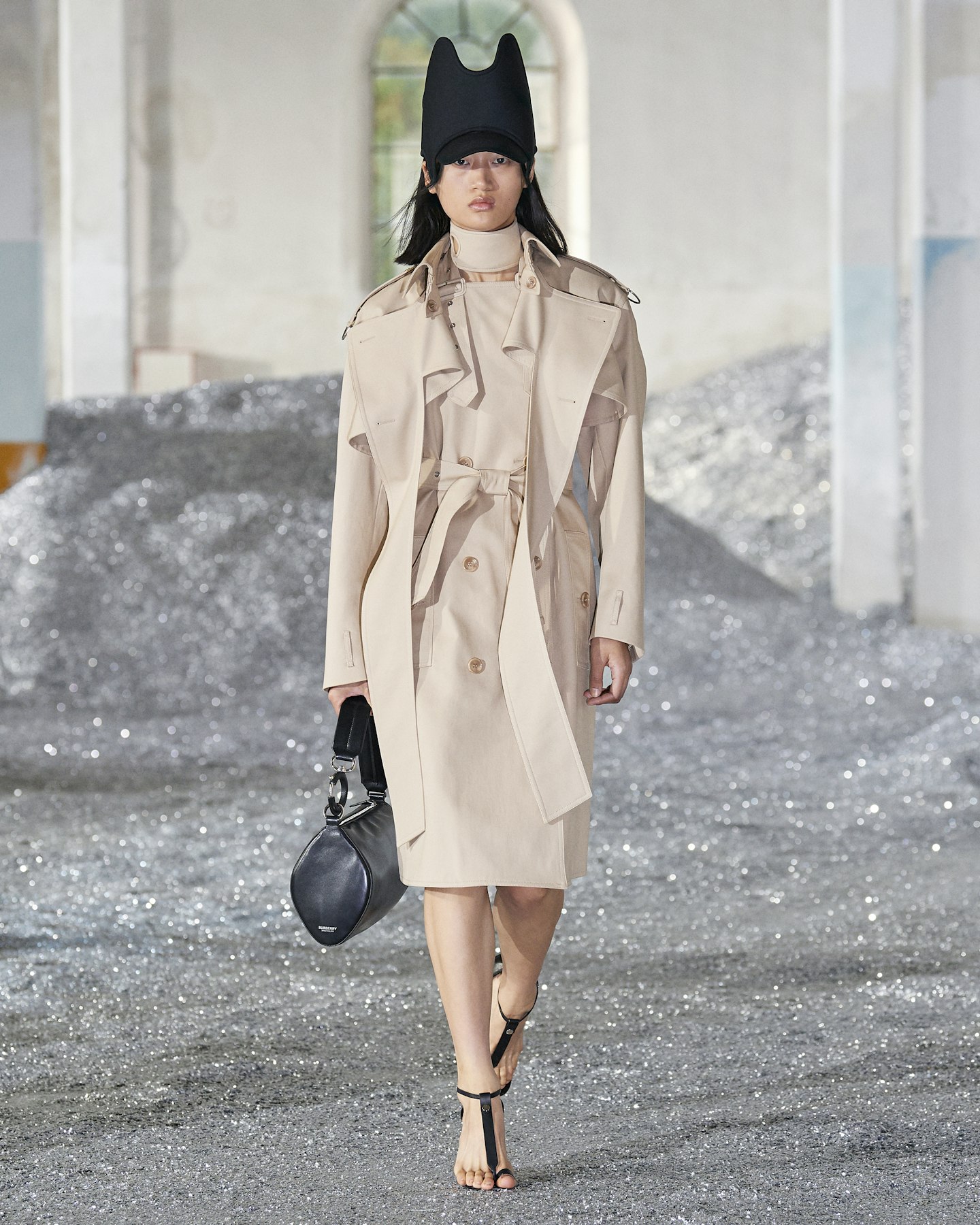 A model wearing a trench coat at Burberry